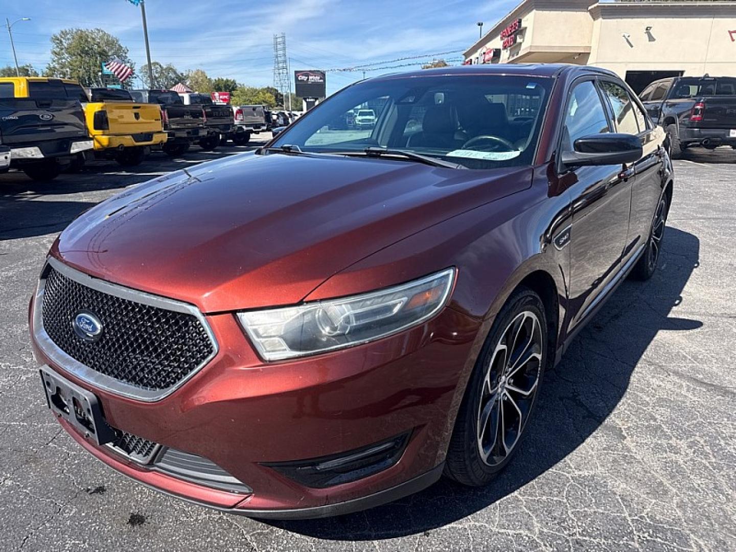 2015 BROWN /BLACK Ford Taurus SHO AWD (1FAHP2KT9FG) with an 3.5L V6 DOHC 24V engine, 6A transmission, located at 3304 Woodville Road, Northwood, OH, 43619, (419) 210-8019, 41.612694, -83.480743 - Your #1 Destination for Auto Loans and mdash;No Matter Your Credit!At our dealership, we believe everyone deserves the opportunity to drive their dream car and mdash;whether you have good credit, bad credit, or no credit at all. With a wide selection of hundreds of cars, trucks, and SUVs, you'll fin- Photo#0