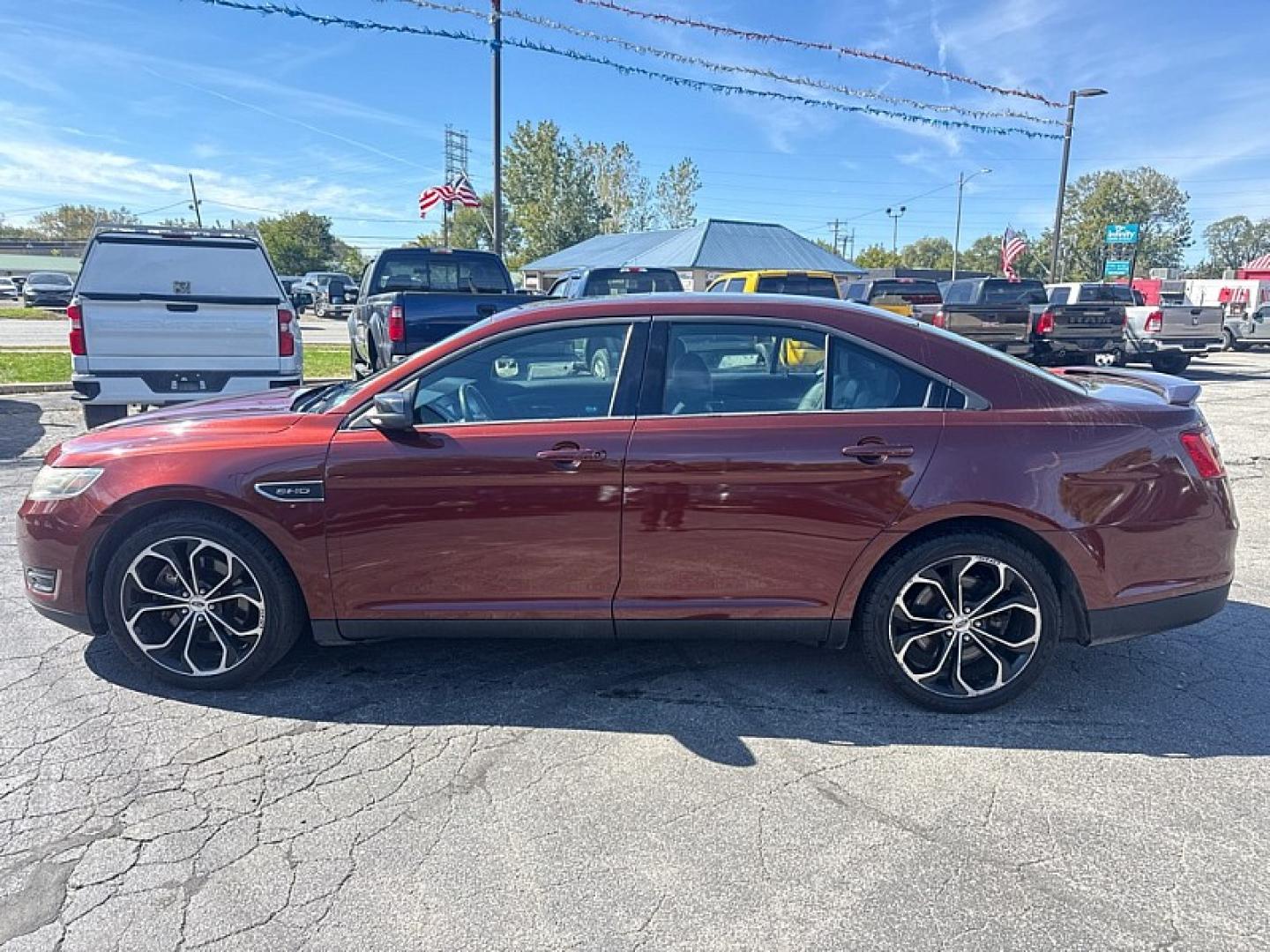 2015 BROWN /BLACK Ford Taurus SHO AWD (1FAHP2KT9FG) with an 3.5L V6 DOHC 24V engine, 6A transmission, located at 3304 Woodville Road, Northwood, OH, 43619, (419) 210-8019, 41.612694, -83.480743 - Your #1 Destination for Auto Loans and mdash;No Matter Your Credit!At our dealership, we believe everyone deserves the opportunity to drive their dream car and mdash;whether you have good credit, bad credit, or no credit at all. With a wide selection of hundreds of cars, trucks, and SUVs, you'll fin- Photo#1