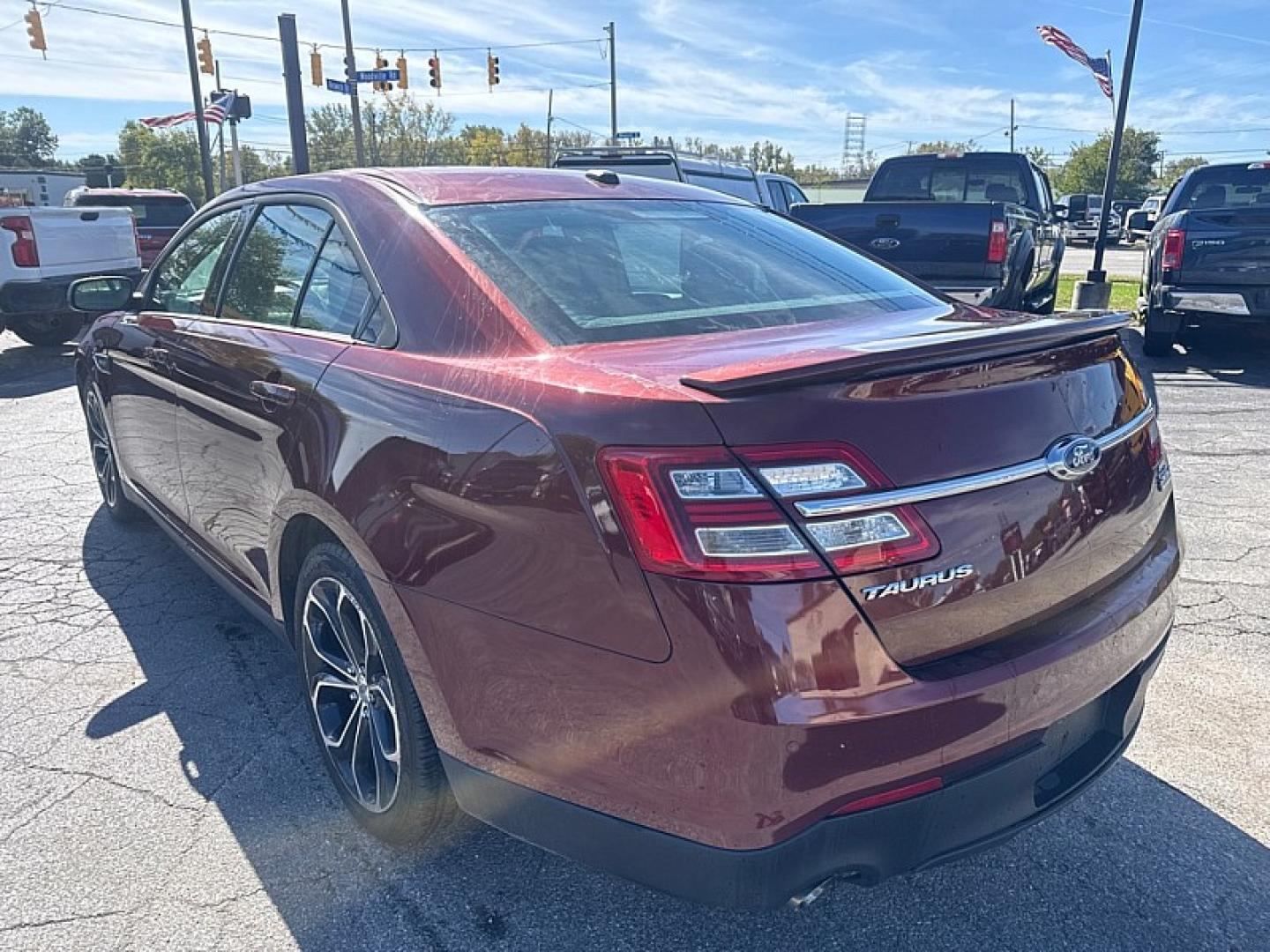 2015 BROWN /BLACK Ford Taurus SHO AWD (1FAHP2KT9FG) with an 3.5L V6 DOHC 24V engine, 6A transmission, located at 3304 Woodville Road, Northwood, OH, 43619, (419) 210-8019, 41.612694, -83.480743 - Your #1 Destination for Auto Loans and mdash;No Matter Your Credit!At our dealership, we believe everyone deserves the opportunity to drive their dream car and mdash;whether you have good credit, bad credit, or no credit at all. With a wide selection of hundreds of cars, trucks, and SUVs, you'll fin- Photo#2