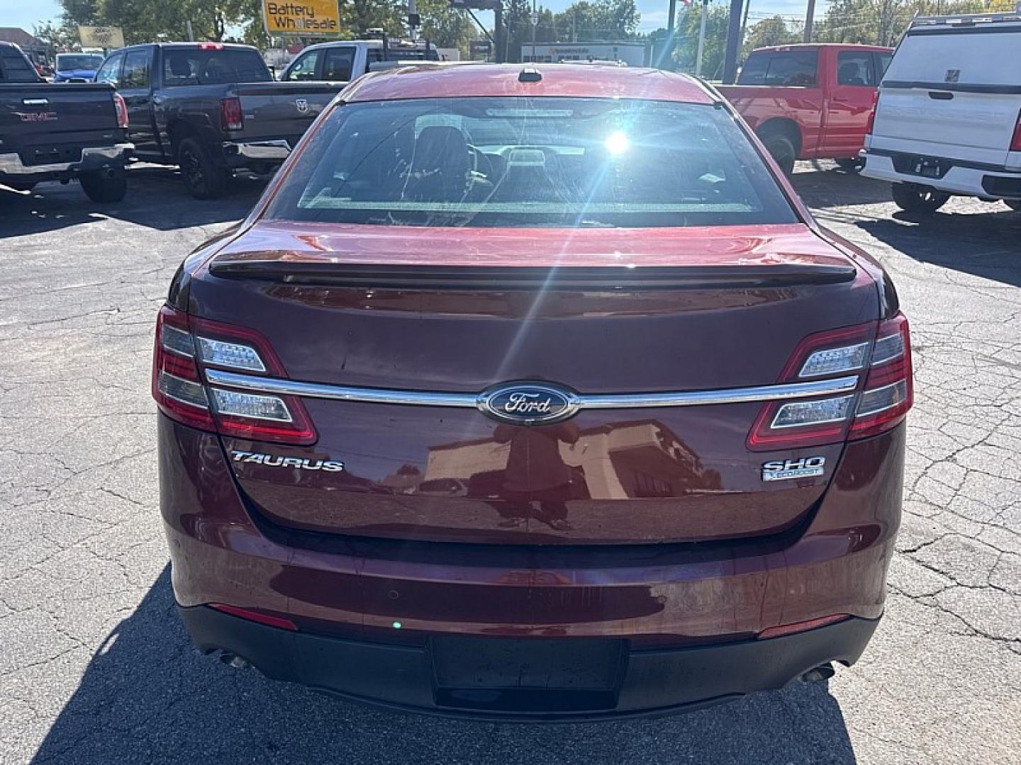 2015 BROWN /BLACK Ford Taurus SHO AWD (1FAHP2KT9FG) with an 3.5L V6 DOHC 24V engine, 6A transmission, located at 3304 Woodville Road, Northwood, OH, 43619, (419) 210-8019, 41.612694, -83.480743 - Your #1 Destination for Auto Loans and mdash;No Matter Your Credit!At our dealership, we believe everyone deserves the opportunity to drive their dream car and mdash;whether you have good credit, bad credit, or no credit at all. With a wide selection of hundreds of cars, trucks, and SUVs, you'll fin- Photo#3