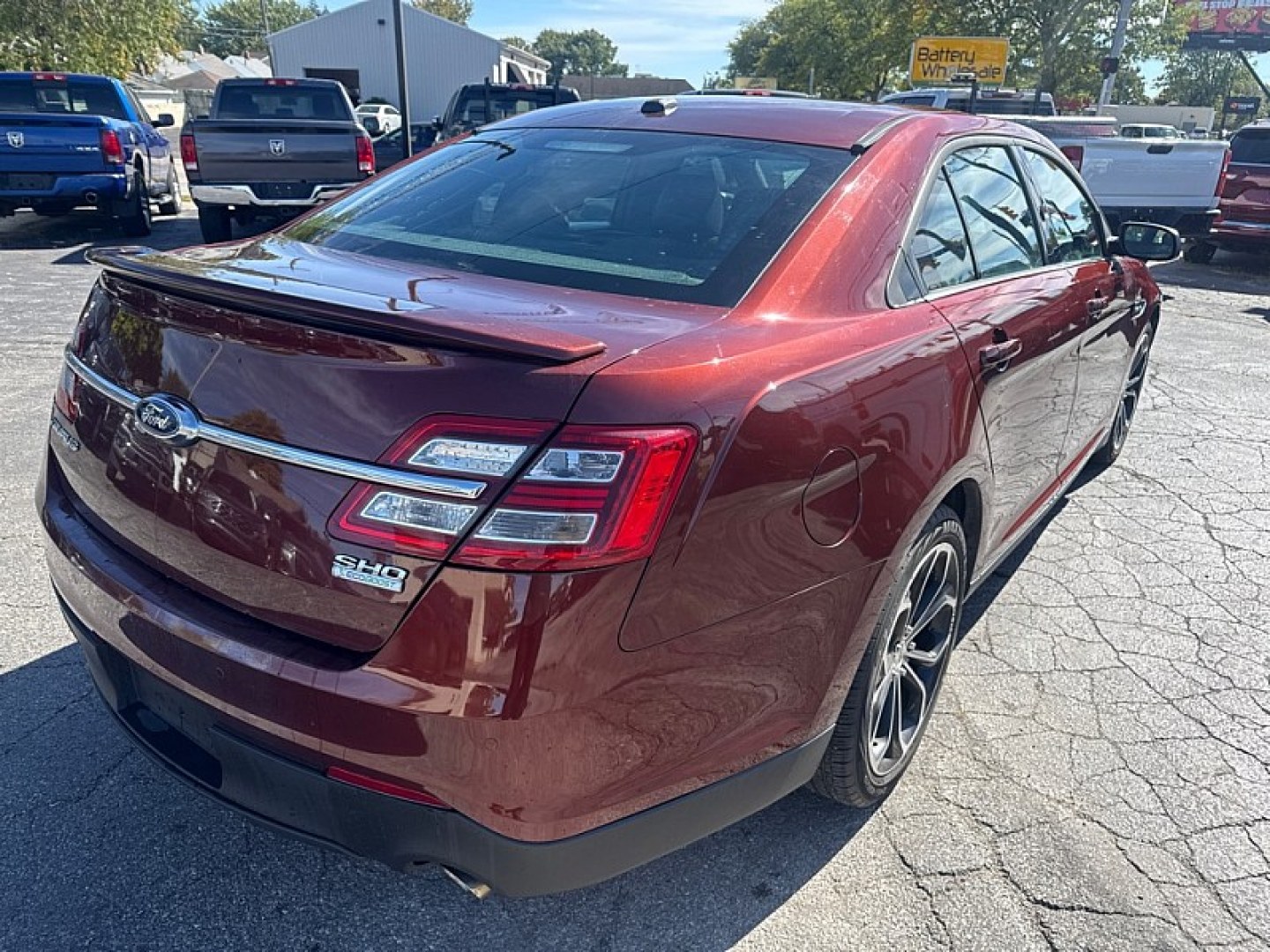 2015 BROWN /BLACK Ford Taurus SHO AWD (1FAHP2KT9FG) with an 3.5L V6 DOHC 24V engine, 6A transmission, located at 3304 Woodville Road, Northwood, OH, 43619, (419) 210-8019, 41.612694, -83.480743 - Your #1 Destination for Auto Loans and mdash;No Matter Your Credit!At our dealership, we believe everyone deserves the opportunity to drive their dream car and mdash;whether you have good credit, bad credit, or no credit at all. With a wide selection of hundreds of cars, trucks, and SUVs, you'll fin- Photo#4