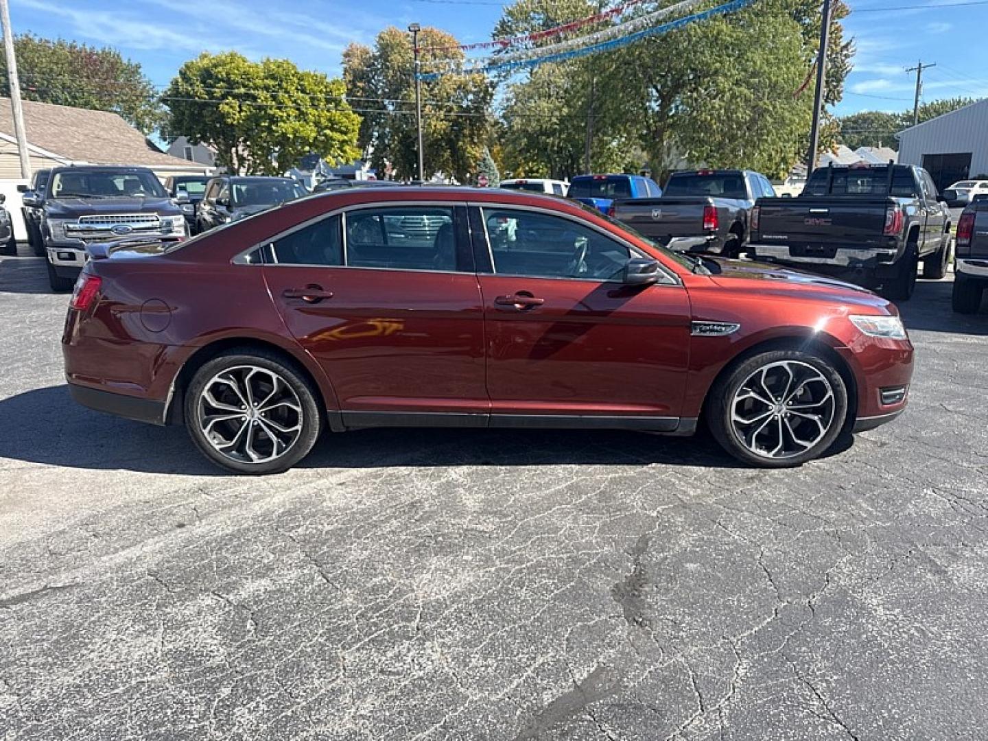 2015 BROWN /BLACK Ford Taurus SHO AWD (1FAHP2KT9FG) with an 3.5L V6 DOHC 24V engine, 6A transmission, located at 3304 Woodville Road, Northwood, OH, 43619, (419) 210-8019, 41.612694, -83.480743 - Your #1 Destination for Auto Loans and mdash;No Matter Your Credit!At our dealership, we believe everyone deserves the opportunity to drive their dream car and mdash;whether you have good credit, bad credit, or no credit at all. With a wide selection of hundreds of cars, trucks, and SUVs, you'll fin- Photo#5