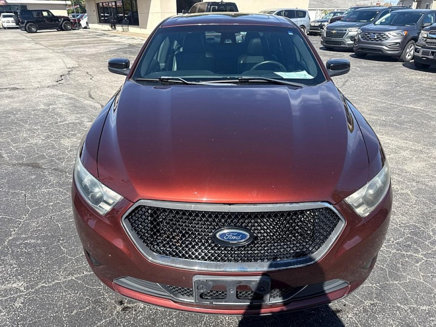 2015 BROWN /BLACK Ford Taurus SHO AWD (1FAHP2KT9FG) with an 3.5L V6 DOHC 24V engine, 6A transmission, located at 3304 Woodville Road, Northwood, OH, 43619, (419) 210-8019, 41.612694, -83.480743 - Your #1 Destination for Auto Loans and mdash;No Matter Your Credit!At our dealership, we believe everyone deserves the opportunity to drive their dream car and mdash;whether you have good credit, bad credit, or no credit at all. With a wide selection of hundreds of cars, trucks, and SUVs, you'll fin- Photo#7