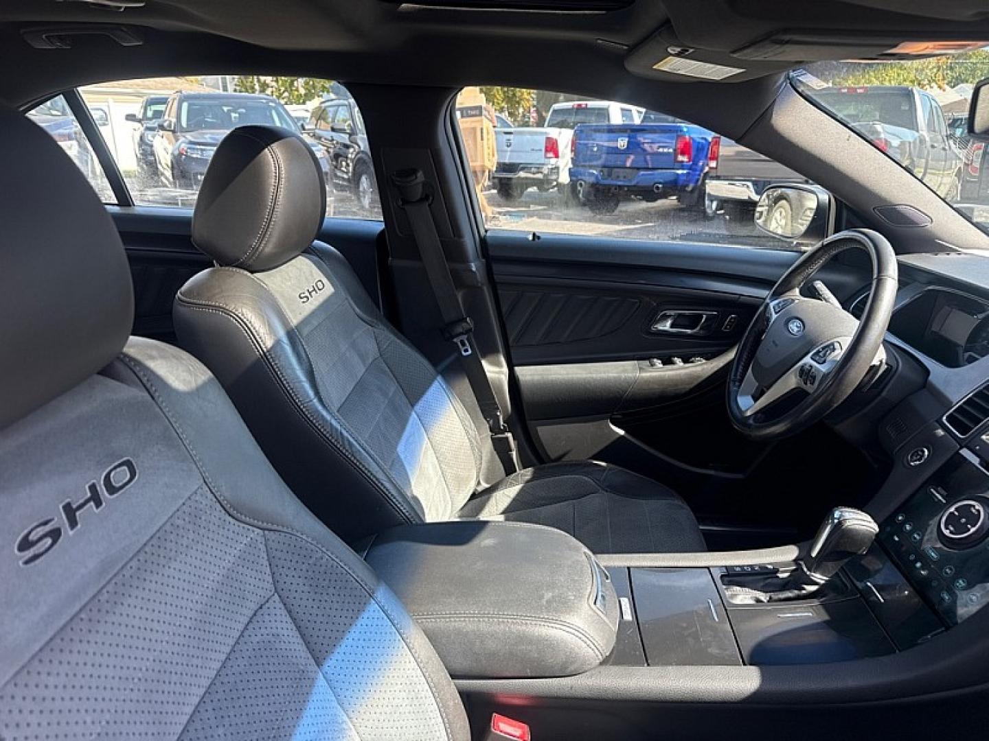 2015 BROWN /BLACK Ford Taurus SHO AWD (1FAHP2KT9FG) with an 3.5L V6 DOHC 24V engine, 6A transmission, located at 3304 Woodville Road, Northwood, OH, 43619, (419) 210-8019, 41.612694, -83.480743 - Your #1 Destination for Auto Loans and mdash;No Matter Your Credit!At our dealership, we believe everyone deserves the opportunity to drive their dream car and mdash;whether you have good credit, bad credit, or no credit at all. With a wide selection of hundreds of cars, trucks, and SUVs, you'll fin- Photo#15