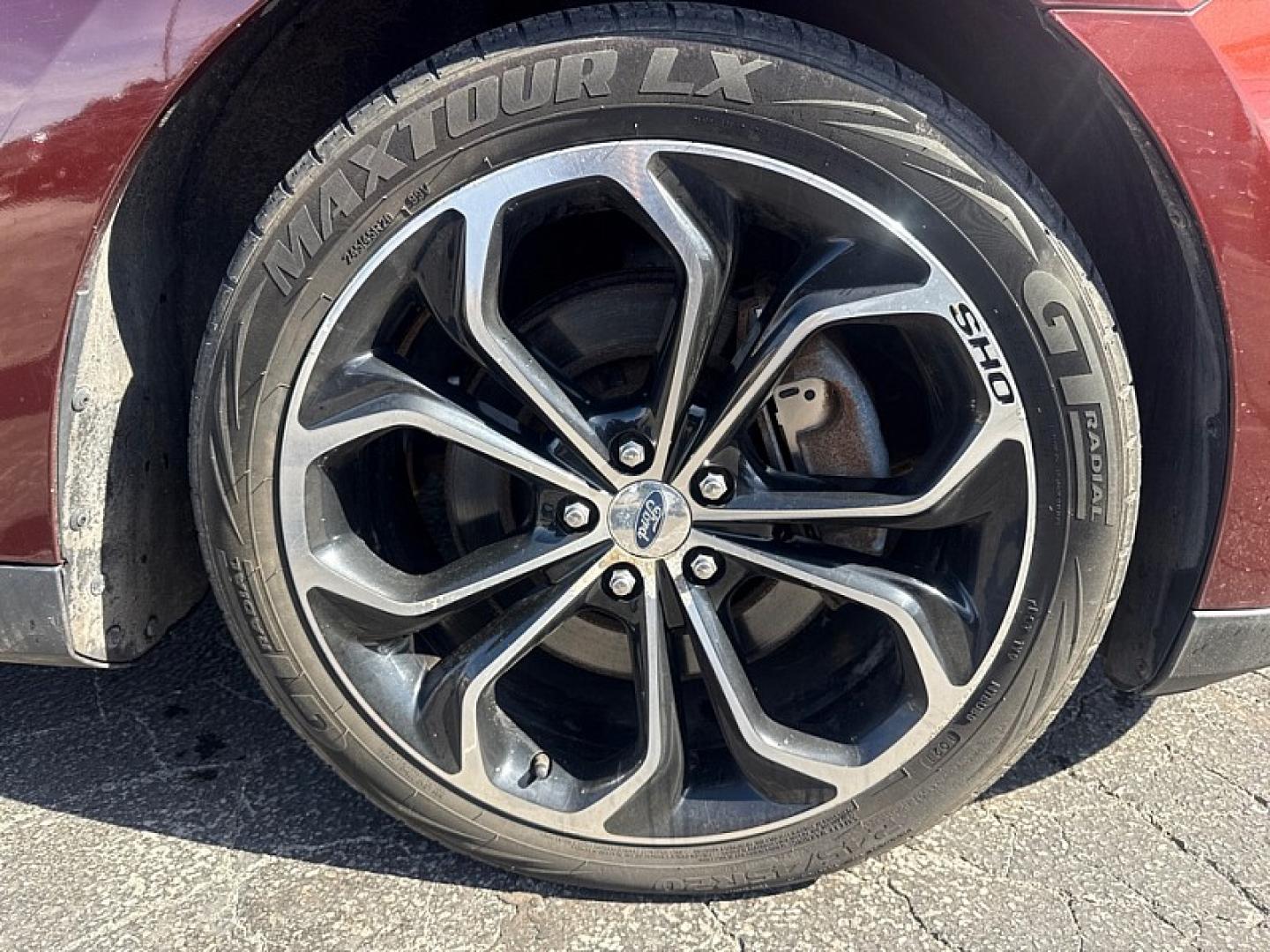 2015 BROWN /BLACK Ford Taurus SHO AWD (1FAHP2KT9FG) with an 3.5L V6 DOHC 24V engine, 6A transmission, located at 3304 Woodville Road, Northwood, OH, 43619, (419) 210-8019, 41.612694, -83.480743 - Your #1 Destination for Auto Loans and mdash;No Matter Your Credit!At our dealership, we believe everyone deserves the opportunity to drive their dream car and mdash;whether you have good credit, bad credit, or no credit at all. With a wide selection of hundreds of cars, trucks, and SUVs, you'll fin- Photo#16