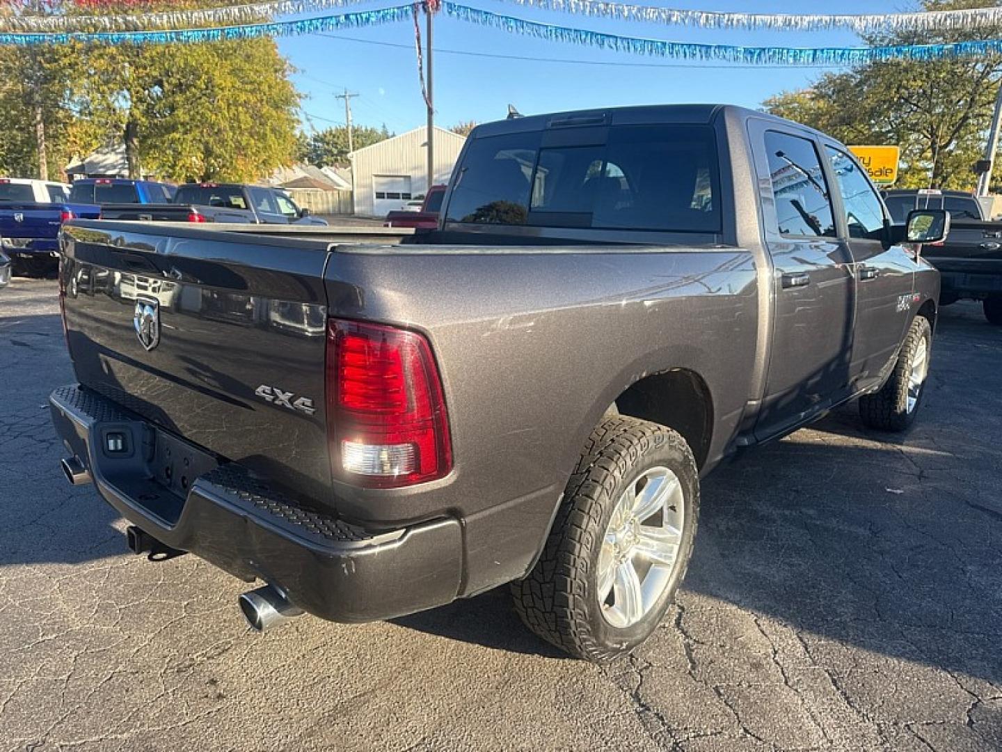 2018 GRAY /BLACK Ram 1500 Sport Crew Cab SWB 4WD (1C6RR7MTXJS) with an 5.7L V8 OHV 16V engine, 8A transmission, located at 3304 Woodville Road, Northwood, OH, 43619, (419) 210-8019, 41.612694, -83.480743 - Your #1 Destination for Auto Loans and mdash;No Matter Your Credit!At our dealership, we believe everyone deserves the opportunity to drive their dream car and mdash;whether you have good credit, bad credit, or no credit at all. With a wide selection of hundreds of cars, trucks, and SUVs, you'll fin- Photo#4