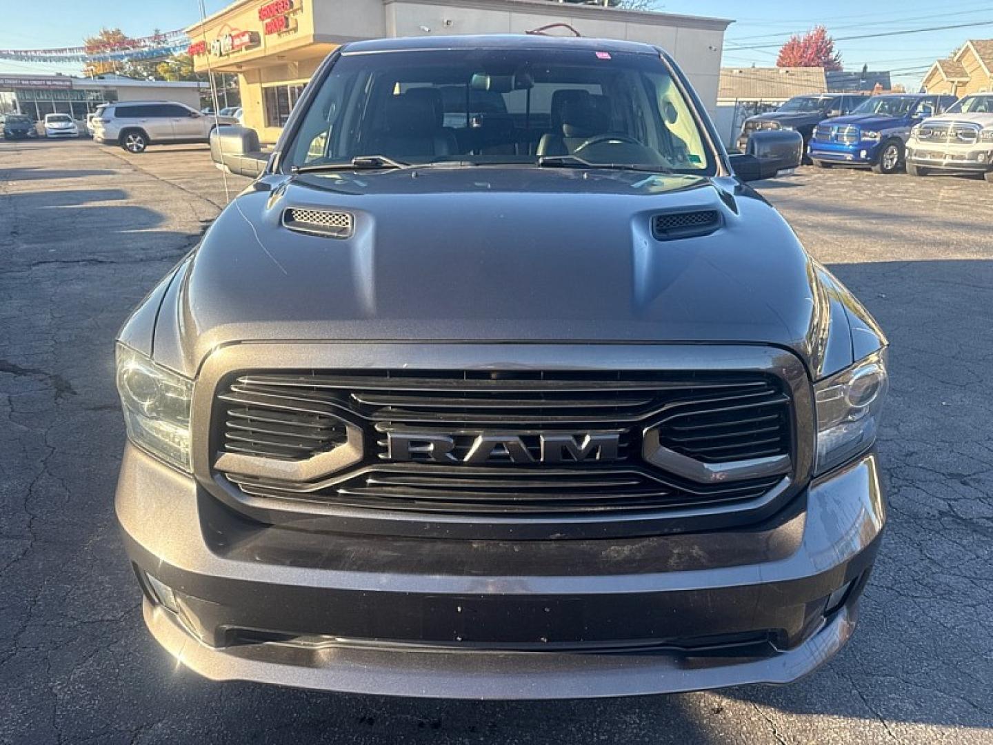 2018 GRAY /BLACK Ram 1500 Sport Crew Cab SWB 4WD (1C6RR7MTXJS) with an 5.7L V8 OHV 16V engine, 8A transmission, located at 3304 Woodville Road, Northwood, OH, 43619, (419) 210-8019, 41.612694, -83.480743 - Your #1 Destination for Auto Loans and mdash;No Matter Your Credit!At our dealership, we believe everyone deserves the opportunity to drive their dream car and mdash;whether you have good credit, bad credit, or no credit at all. With a wide selection of hundreds of cars, trucks, and SUVs, you'll fin- Photo#7