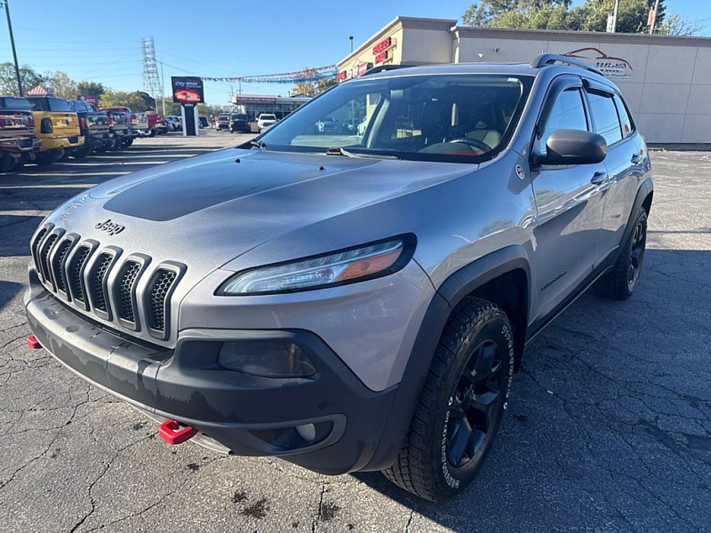2016 SILVER /BLACK Jeep Cherokee Trailhawk 4WD (1C4PJMBS5GW) with an 3.2L V6 DOHC 24V engine, 9A transmission, located at 3304 Woodville Road, Northwood, OH, 43619, (419) 210-8019, 41.612694, -83.480743 - Your #1 Destination for Auto Loans and mdash;No Matter Your Credit!At our dealership, we believe everyone deserves the opportunity to drive their dream car and mdash;whether you have good credit, bad credit, or no credit at all. With a wide selection of hundreds of cars, trucks, and SUVs, you'll fin- Photo#0
