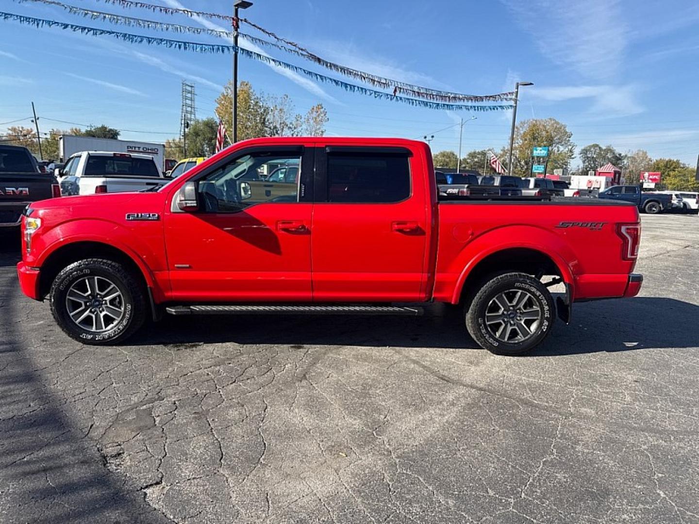 2015 RED Ford F-150 XLT SuperCrew 6.5-ft. Bed 4WD (1FTEW1EG3FK) with an 3.5L V6 TURBO engine, 6-Speed Automatic transmission, located at 3304 Woodville Road, Northwood, OH, 43619, (419) 210-8019, 41.612694, -83.480743 - Your #1 Destination for Auto Loans and mdash;No Matter Your Credit!At our dealership, we believe everyone deserves the opportunity to drive their dream car and mdash;whether you have good credit, bad credit, or no credit at all. With a wide selection of hundreds of cars, trucks, and SUVs, you'll fin- Photo#1