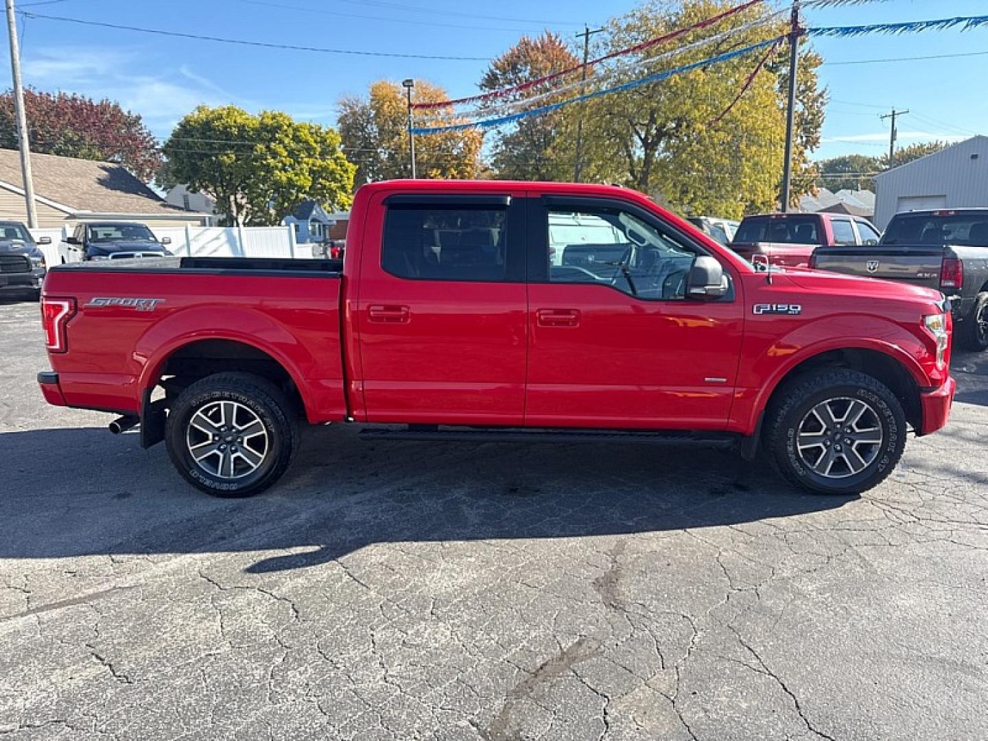 2015 RED Ford F-150 XLT SuperCrew 6.5-ft. Bed 4WD (1FTEW1EG3FK) with an 3.5L V6 TURBO engine, 6-Speed Automatic transmission, located at 3304 Woodville Road, Northwood, OH, 43619, (419) 210-8019, 41.612694, -83.480743 - Your #1 Destination for Auto Loans and mdash;No Matter Your Credit!At our dealership, we believe everyone deserves the opportunity to drive their dream car and mdash;whether you have good credit, bad credit, or no credit at all. With a wide selection of hundreds of cars, trucks, and SUVs, you'll fin- Photo#5