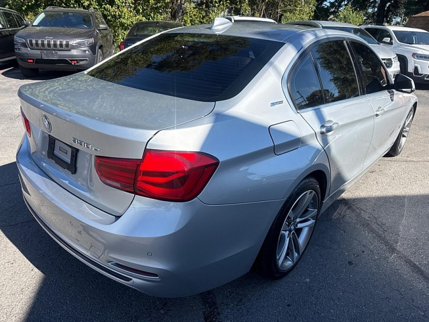 2017 SILVER /TAN BMW 3-Series 330e iPerformance Sedan (WBA8E1C39HA) with an 2.0L L4 DOHC 16V HYBRID engine, 8A transmission, located at 3304 Woodville Road, Northwood, OH, 43619, (419) 210-8019, 41.612694, -83.480743 - Your #1 Destination for Auto Loans and mdash;No Matter Your Credit!At our dealership, we believe everyone deserves the opportunity to drive their dream car and mdash;whether you have good credit, bad credit, or no credit at all. With a wide selection of hundreds of cars, trucks, and SUVs, you'll fin- Photo#4