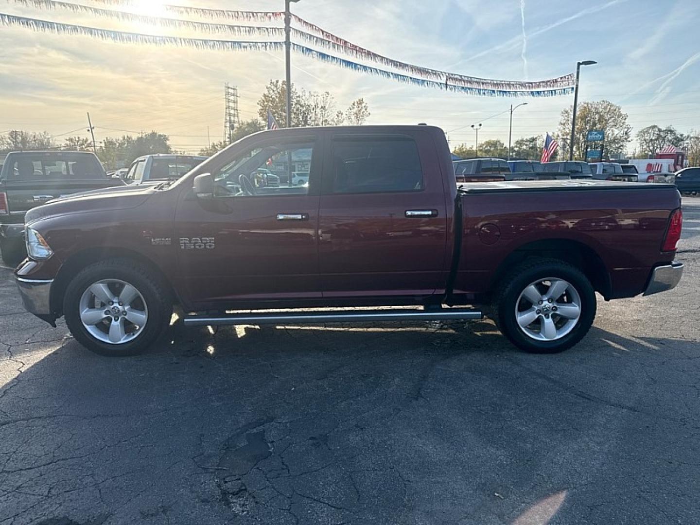 2017 MAROON /GRAY Ram 1500 SLT Crew Cab SWB 4WD (1C6RR7LT8HS) with an 5.7L V8 OHV 16V engine, 8A transmission, located at 3304 Woodville Road, Northwood, OH, 43619, (419) 210-8019, 41.612694, -83.480743 - Your #1 Destination for Auto Loans and mdash;No Matter Your Credit!At our dealership, we believe everyone deserves the opportunity to drive their dream car and mdash;whether you have good credit, bad credit, or no credit at all. With a wide selection of hundreds of cars, trucks, and SUVs, you'll fin- Photo#1