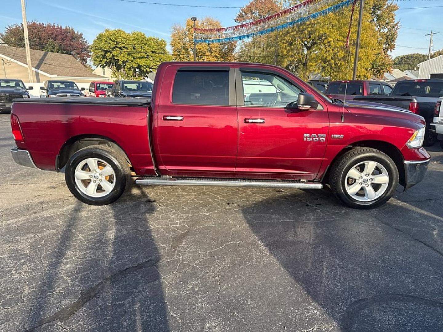 2017 MAROON /GRAY Ram 1500 SLT Crew Cab SWB 4WD (1C6RR7LT8HS) with an 5.7L V8 OHV 16V engine, 8A transmission, located at 3304 Woodville Road, Northwood, OH, 43619, (419) 210-8019, 41.612694, -83.480743 - Your #1 Destination for Auto Loans and mdash;No Matter Your Credit!At our dealership, we believe everyone deserves the opportunity to drive their dream car and mdash;whether you have good credit, bad credit, or no credit at all. With a wide selection of hundreds of cars, trucks, and SUVs, you'll fin- Photo#5