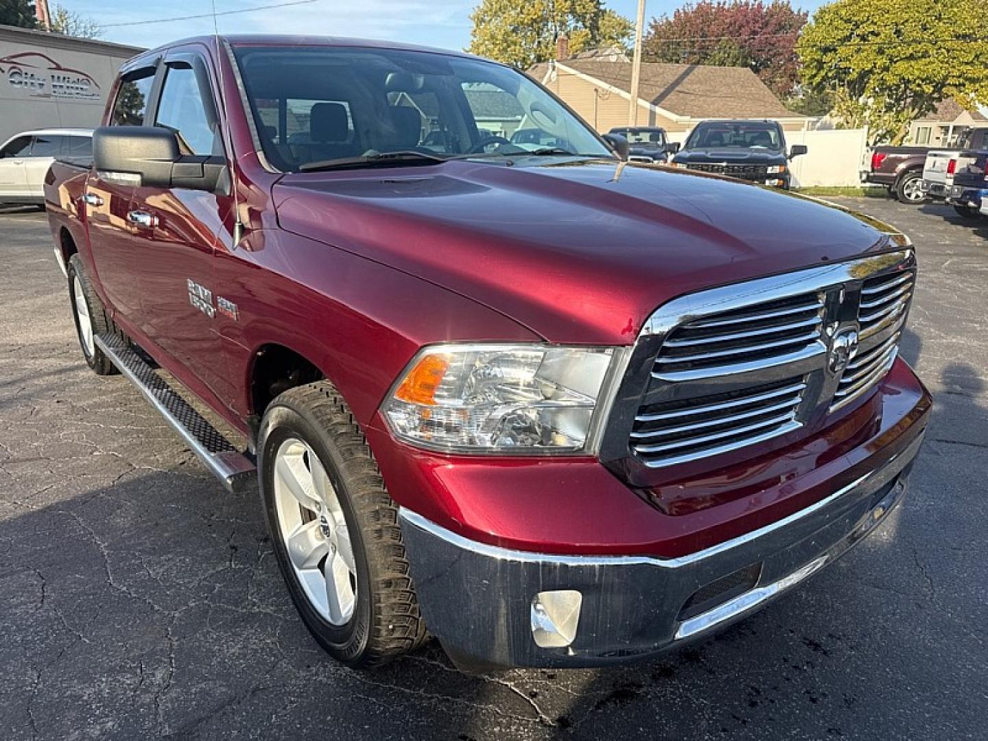 2017 MAROON /GRAY Ram 1500 SLT Crew Cab SWB 4WD (1C6RR7LT8HS) with an 5.7L V8 OHV 16V engine, 8A transmission, located at 3304 Woodville Road, Northwood, OH, 43619, (419) 210-8019, 41.612694, -83.480743 - Your #1 Destination for Auto Loans and mdash;No Matter Your Credit!At our dealership, we believe everyone deserves the opportunity to drive their dream car and mdash;whether you have good credit, bad credit, or no credit at all. With a wide selection of hundreds of cars, trucks, and SUVs, you'll fin- Photo#6