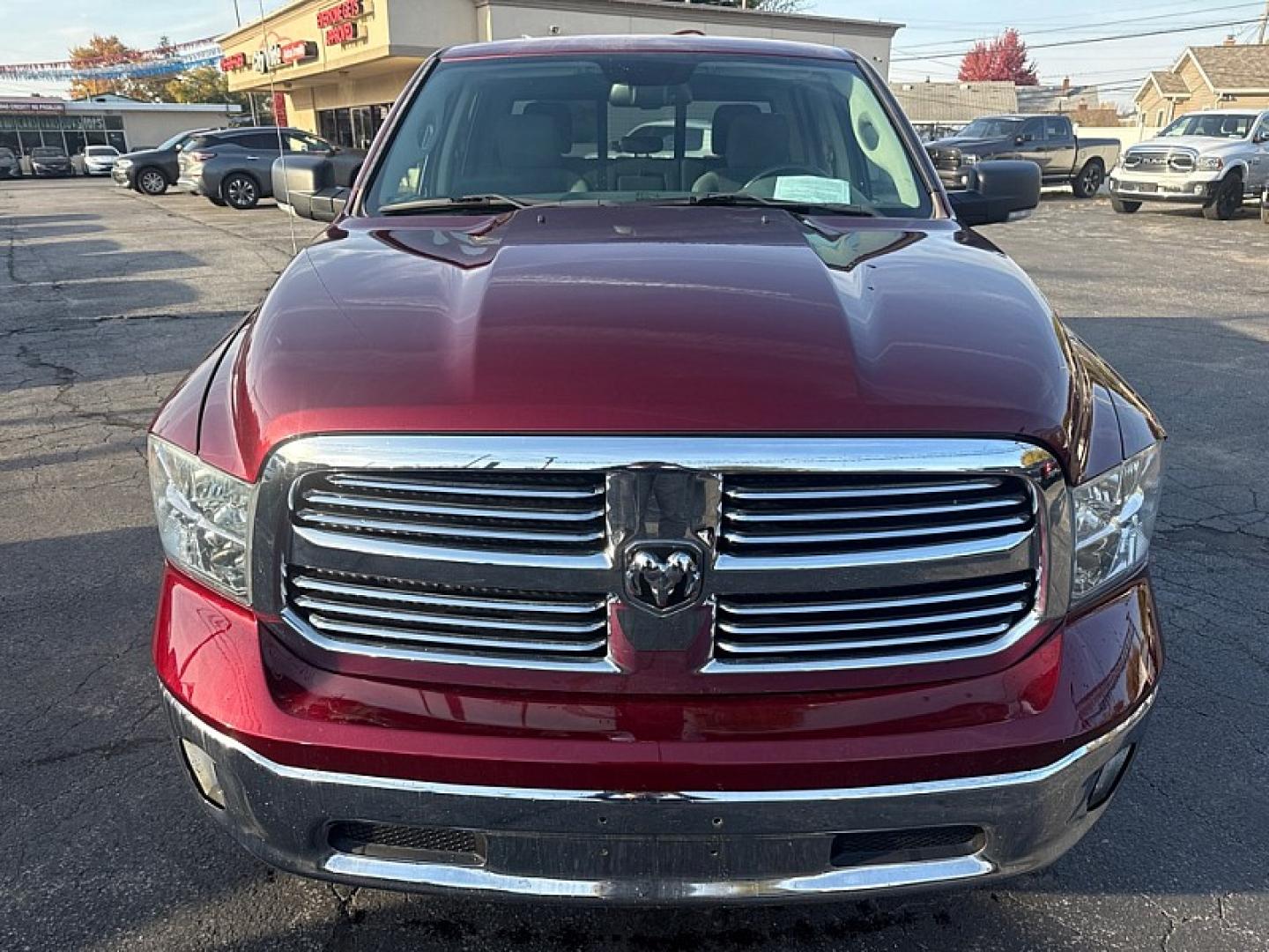 2017 MAROON /GRAY Ram 1500 SLT Crew Cab SWB 4WD (1C6RR7LT8HS) with an 5.7L V8 OHV 16V engine, 8A transmission, located at 3304 Woodville Road, Northwood, OH, 43619, (419) 210-8019, 41.612694, -83.480743 - Your #1 Destination for Auto Loans and mdash;No Matter Your Credit!At our dealership, we believe everyone deserves the opportunity to drive their dream car and mdash;whether you have good credit, bad credit, or no credit at all. With a wide selection of hundreds of cars, trucks, and SUVs, you'll fin- Photo#7