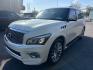 2016 WHITE /BLACK Infiniti QX80 4WD (JN8AZ2NC7G9) with an 5.6L V8 DOHC 32V engine, 7A transmission, located at 3304 Woodville Road, Northwood, OH, 43619, (419) 210-8019, 41.612694, -83.480743 - Your #1 Destination for Auto Loans and mdash;No Matter Your Credit!At our dealership, we believe everyone deserves the opportunity to drive their dream car and mdash;whether you have good credit, bad credit, or no credit at all. With a wide selection of hundreds of cars, trucks, and SUVs, you'll fin- Photo#0