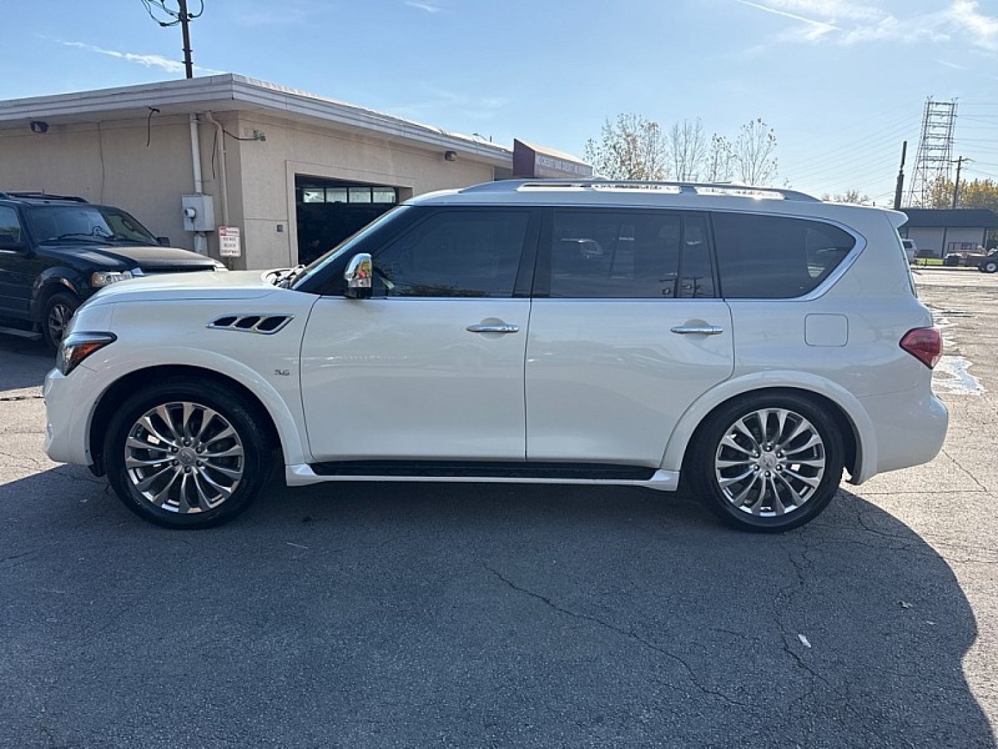2016 WHITE /BLACK Infiniti QX80 4WD (JN8AZ2NC7G9) with an 5.6L V8 DOHC 32V engine, 7A transmission, located at 3304 Woodville Road, Northwood, OH, 43619, (419) 210-8019, 41.612694, -83.480743 - Your #1 Destination for Auto Loans and mdash;No Matter Your Credit!At our dealership, we believe everyone deserves the opportunity to drive their dream car and mdash;whether you have good credit, bad credit, or no credit at all. With a wide selection of hundreds of cars, trucks, and SUVs, you'll fin- Photo#1