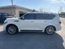 2016 WHITE /BLACK Infiniti QX80 4WD (JN8AZ2NC7G9) with an 5.6L V8 DOHC 32V engine, 7A transmission, located at 3304 Woodville Road, Northwood, OH, 43619, (419) 210-8019, 41.612694, -83.480743 - Your #1 Destination for Auto Loans and mdash;No Matter Your Credit!At our dealership, we believe everyone deserves the opportunity to drive their dream car and mdash;whether you have good credit, bad credit, or no credit at all. With a wide selection of hundreds of cars, trucks, and SUVs, you'll fin- Photo#1