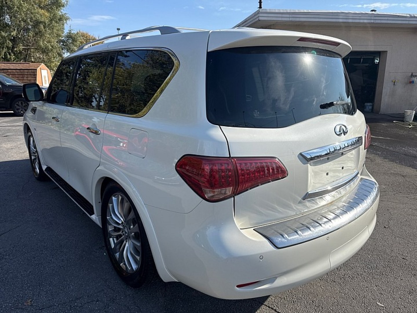 2016 WHITE /BLACK Infiniti QX80 4WD (JN8AZ2NC7G9) with an 5.6L V8 DOHC 32V engine, 7A transmission, located at 3304 Woodville Road, Northwood, OH, 43619, (419) 210-8019, 41.612694, -83.480743 - Your #1 Destination for Auto Loans and mdash;No Matter Your Credit!At our dealership, we believe everyone deserves the opportunity to drive their dream car and mdash;whether you have good credit, bad credit, or no credit at all. With a wide selection of hundreds of cars, trucks, and SUVs, you'll fin- Photo#2
