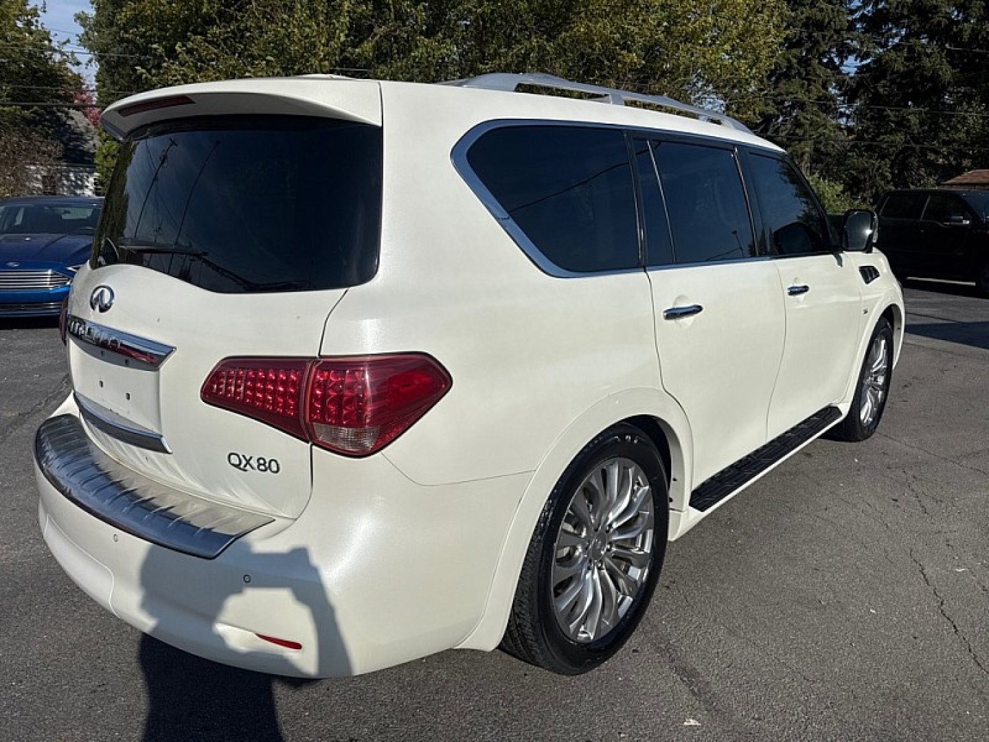 2016 WHITE /BLACK Infiniti QX80 4WD (JN8AZ2NC7G9) with an 5.6L V8 DOHC 32V engine, 7A transmission, located at 3304 Woodville Road, Northwood, OH, 43619, (419) 210-8019, 41.612694, -83.480743 - Your #1 Destination for Auto Loans and mdash;No Matter Your Credit!At our dealership, we believe everyone deserves the opportunity to drive their dream car and mdash;whether you have good credit, bad credit, or no credit at all. With a wide selection of hundreds of cars, trucks, and SUVs, you'll fin- Photo#4