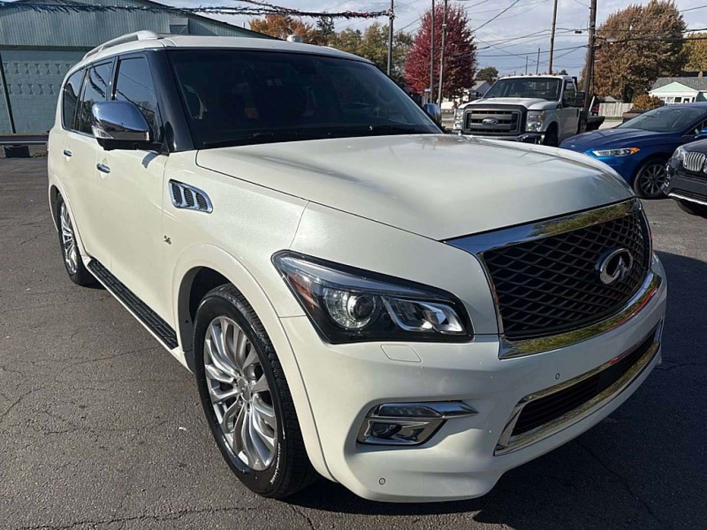 2016 WHITE /BLACK Infiniti QX80 4WD (JN8AZ2NC7G9) with an 5.6L V8 DOHC 32V engine, 7A transmission, located at 3304 Woodville Road, Northwood, OH, 43619, (419) 210-8019, 41.612694, -83.480743 - Your #1 Destination for Auto Loans and mdash;No Matter Your Credit!At our dealership, we believe everyone deserves the opportunity to drive their dream car and mdash;whether you have good credit, bad credit, or no credit at all. With a wide selection of hundreds of cars, trucks, and SUVs, you'll fin- Photo#6