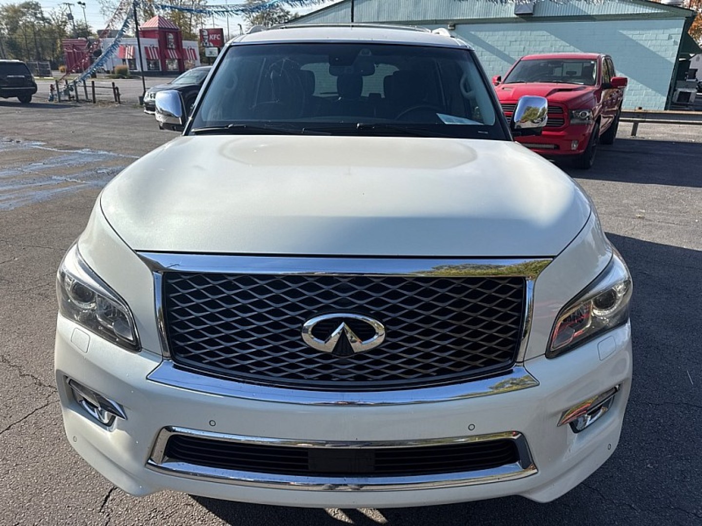 2016 WHITE /BLACK Infiniti QX80 4WD (JN8AZ2NC7G9) with an 5.6L V8 DOHC 32V engine, 7A transmission, located at 3304 Woodville Road, Northwood, OH, 43619, (419) 210-8019, 41.612694, -83.480743 - Your #1 Destination for Auto Loans and mdash;No Matter Your Credit!At our dealership, we believe everyone deserves the opportunity to drive their dream car and mdash;whether you have good credit, bad credit, or no credit at all. With a wide selection of hundreds of cars, trucks, and SUVs, you'll fin- Photo#7