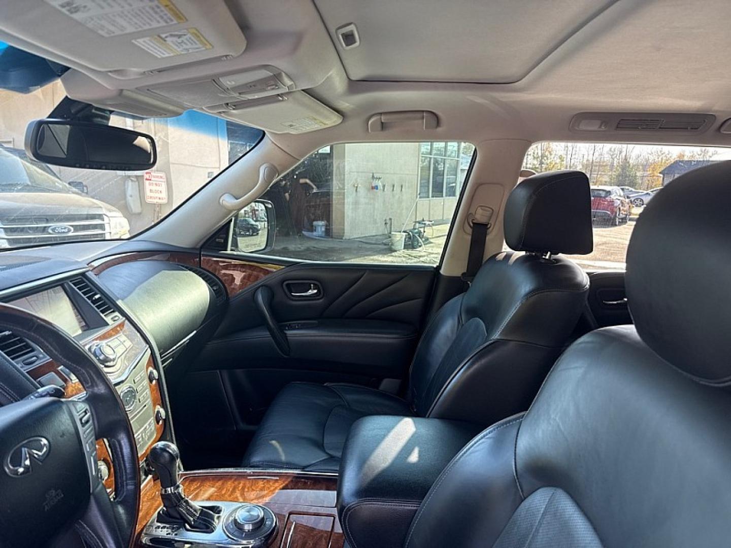 2016 WHITE /BLACK Infiniti QX80 4WD (JN8AZ2NC7G9) with an 5.6L V8 DOHC 32V engine, 7A transmission, located at 3304 Woodville Road, Northwood, OH, 43619, (419) 210-8019, 41.612694, -83.480743 - Your #1 Destination for Auto Loans and mdash;No Matter Your Credit!At our dealership, we believe everyone deserves the opportunity to drive their dream car and mdash;whether you have good credit, bad credit, or no credit at all. With a wide selection of hundreds of cars, trucks, and SUVs, you'll fin- Photo#9