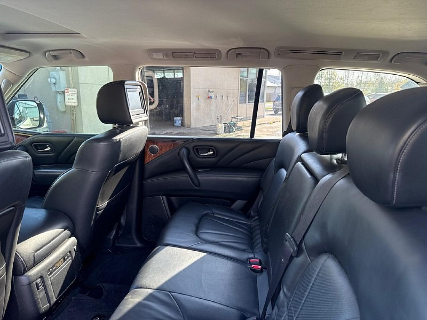 2016 WHITE /BLACK Infiniti QX80 4WD (JN8AZ2NC7G9) with an 5.6L V8 DOHC 32V engine, 7A transmission, located at 3304 Woodville Road, Northwood, OH, 43619, (419) 210-8019, 41.612694, -83.480743 - Your #1 Destination for Auto Loans and mdash;No Matter Your Credit!At our dealership, we believe everyone deserves the opportunity to drive their dream car and mdash;whether you have good credit, bad credit, or no credit at all. With a wide selection of hundreds of cars, trucks, and SUVs, you'll fin- Photo#11