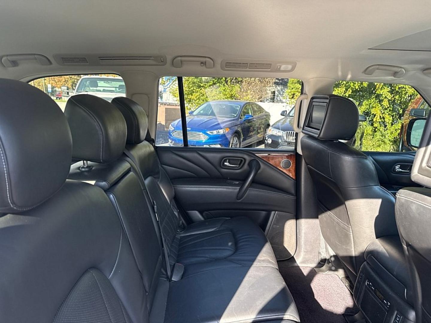 2016 WHITE /BLACK Infiniti QX80 4WD (JN8AZ2NC7G9) with an 5.6L V8 DOHC 32V engine, 7A transmission, located at 3304 Woodville Road, Northwood, OH, 43619, (419) 210-8019, 41.612694, -83.480743 - Your #1 Destination for Auto Loans and mdash;No Matter Your Credit!At our dealership, we believe everyone deserves the opportunity to drive their dream car and mdash;whether you have good credit, bad credit, or no credit at all. With a wide selection of hundreds of cars, trucks, and SUVs, you'll fin- Photo#13
