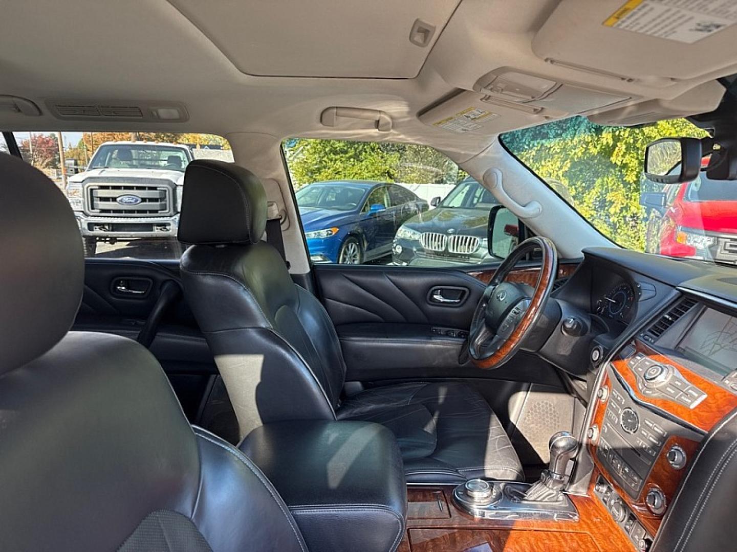 2016 WHITE /BLACK Infiniti QX80 4WD (JN8AZ2NC7G9) with an 5.6L V8 DOHC 32V engine, 7A transmission, located at 3304 Woodville Road, Northwood, OH, 43619, (419) 210-8019, 41.612694, -83.480743 - Your #1 Destination for Auto Loans and mdash;No Matter Your Credit!At our dealership, we believe everyone deserves the opportunity to drive their dream car and mdash;whether you have good credit, bad credit, or no credit at all. With a wide selection of hundreds of cars, trucks, and SUVs, you'll fin- Photo#15