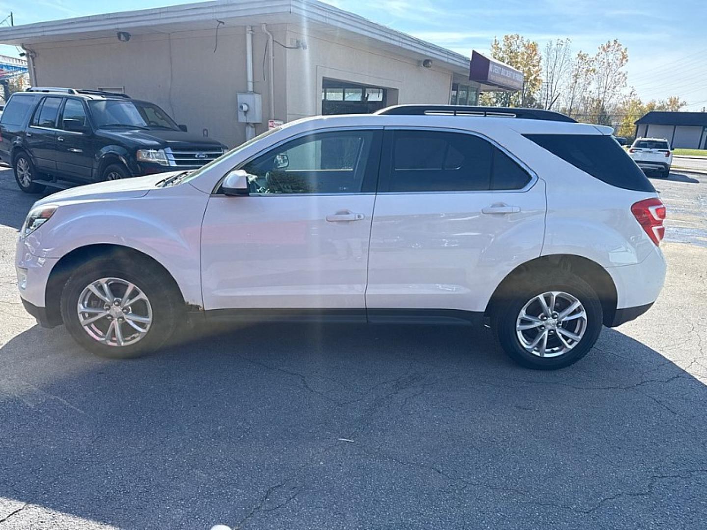 2016 WHITE /BLACK Chevrolet Equinox LT AWD (2GNFLFEK3G6) with an 2.4L L4 DOHC 16V FFV engine, 6A transmission, located at 3304 Woodville Road, Northwood, OH, 43619, (419) 210-8019, 41.612694, -83.480743 - Your #1 Destination for Auto Loans and mdash;No Matter Your Credit!At our dealership, we believe everyone deserves the opportunity to drive their dream car and mdash;whether you have good credit, bad credit, or no credit at all. With a wide selection of hundreds of cars, trucks, and SUVs, you'll fin- Photo#3