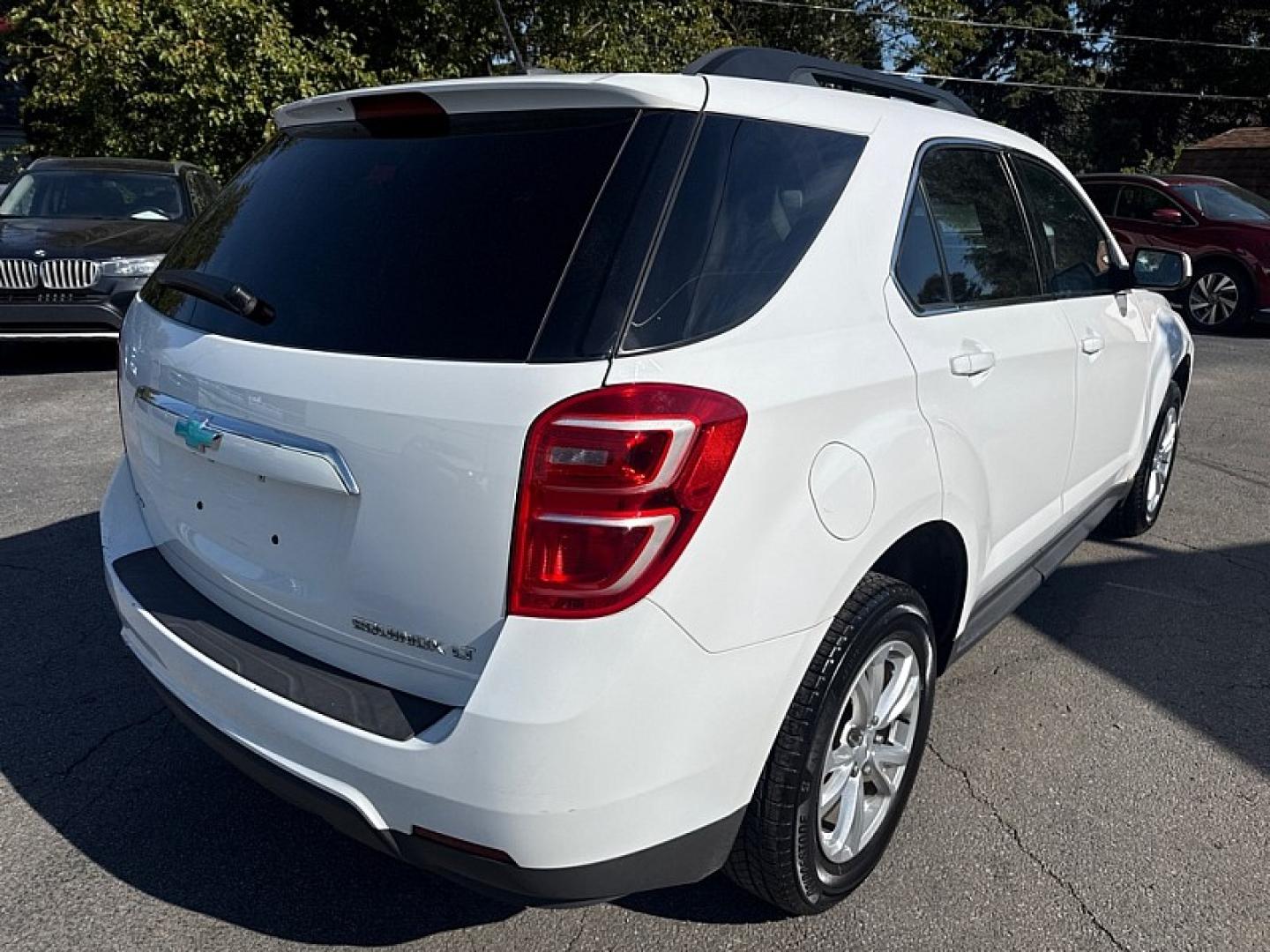 2016 WHITE /BLACK Chevrolet Equinox LT AWD (2GNFLFEK3G6) with an 2.4L L4 DOHC 16V FFV engine, 6A transmission, located at 3304 Woodville Road, Northwood, OH, 43619, (419) 210-8019, 41.612694, -83.480743 - Your #1 Destination for Auto Loans and mdash;No Matter Your Credit!At our dealership, we believe everyone deserves the opportunity to drive their dream car and mdash;whether you have good credit, bad credit, or no credit at all. With a wide selection of hundreds of cars, trucks, and SUVs, you'll fin- Photo#6