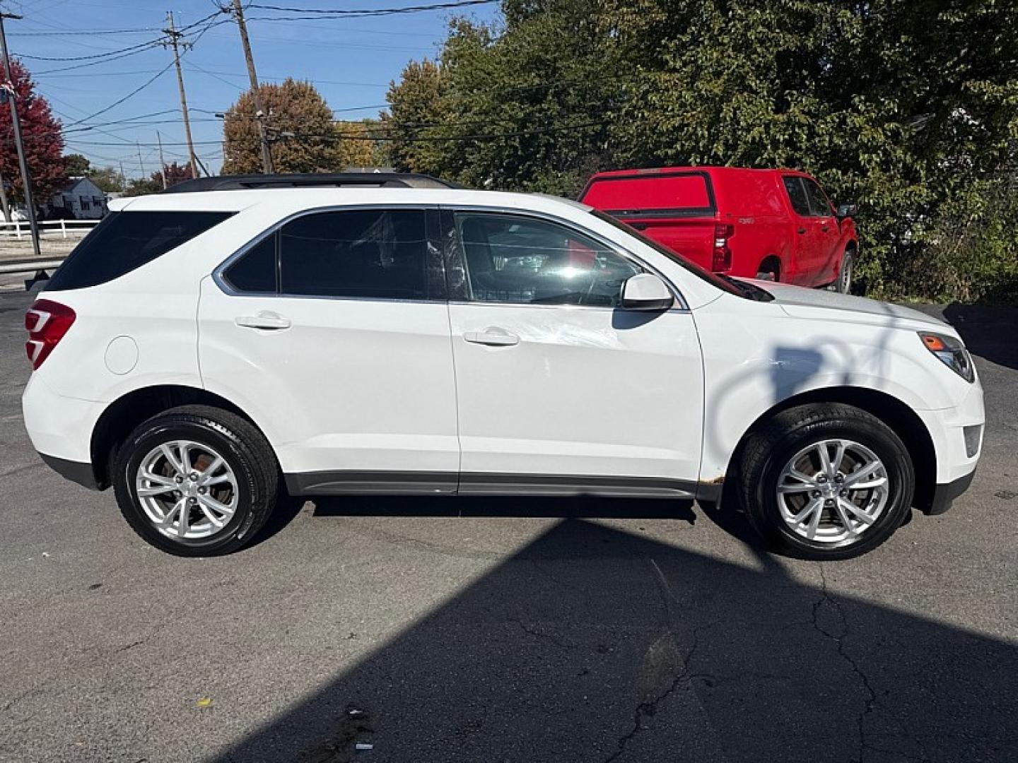 2016 WHITE /BLACK Chevrolet Equinox LT AWD (2GNFLFEK3G6) with an 2.4L L4 DOHC 16V FFV engine, 6A transmission, located at 3304 Woodville Road, Northwood, OH, 43619, (419) 210-8019, 41.612694, -83.480743 - Your #1 Destination for Auto Loans and mdash;No Matter Your Credit!At our dealership, we believe everyone deserves the opportunity to drive their dream car and mdash;whether you have good credit, bad credit, or no credit at all. With a wide selection of hundreds of cars, trucks, and SUVs, you'll fin- Photo#7