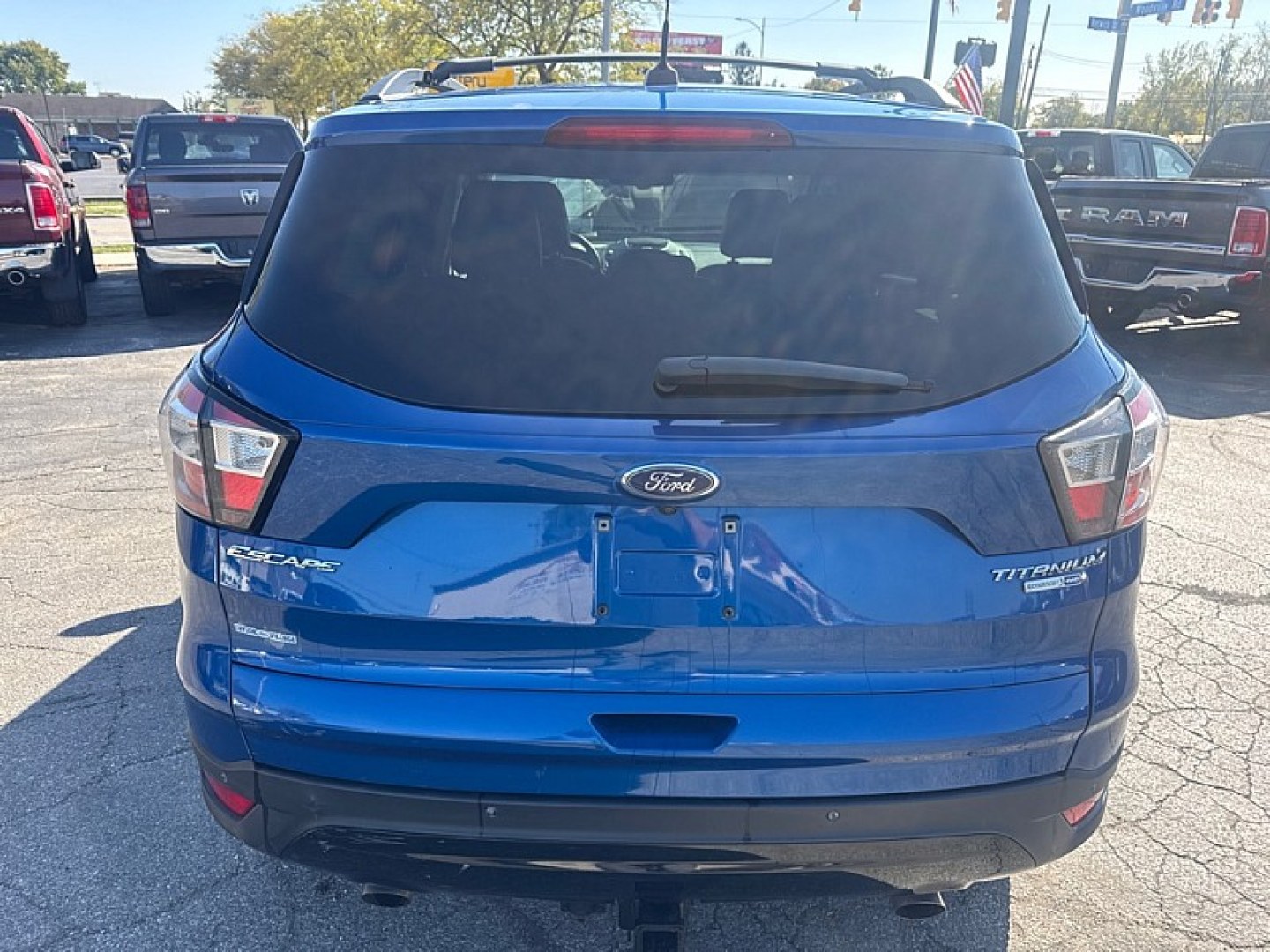 2017 BLUE /BLACK Ford Escape Titanium 4WD (1FMCU9J95HU) with an 2.0L L4 DOHC 16V engine, 6A transmission, located at 3304 Woodville Road, Northwood, OH, 43619, (419) 210-8019, 41.612694, -83.480743 - Your #1 Destination for Auto Loans and mdash;No Matter Your Credit!At our dealership, we believe everyone deserves the opportunity to drive their dream car and mdash;whether you have good credit, bad credit, or no credit at all. With a wide selection of hundreds of cars, trucks, and SUVs, you'll fin- Photo#3