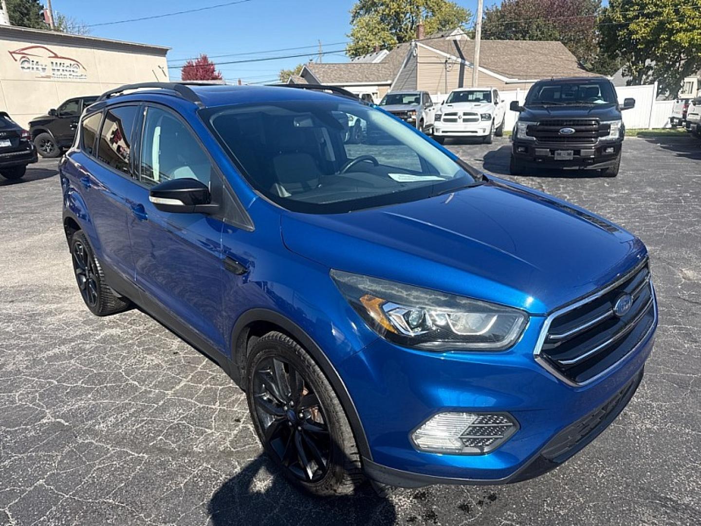 2017 BLUE /BLACK Ford Escape Titanium 4WD (1FMCU9J95HU) with an 2.0L L4 DOHC 16V engine, 6A transmission, located at 3304 Woodville Road, Northwood, OH, 43619, (419) 210-8019, 41.612694, -83.480743 - Your #1 Destination for Auto Loans and mdash;No Matter Your Credit!At our dealership, we believe everyone deserves the opportunity to drive their dream car and mdash;whether you have good credit, bad credit, or no credit at all. With a wide selection of hundreds of cars, trucks, and SUVs, you'll fin- Photo#6