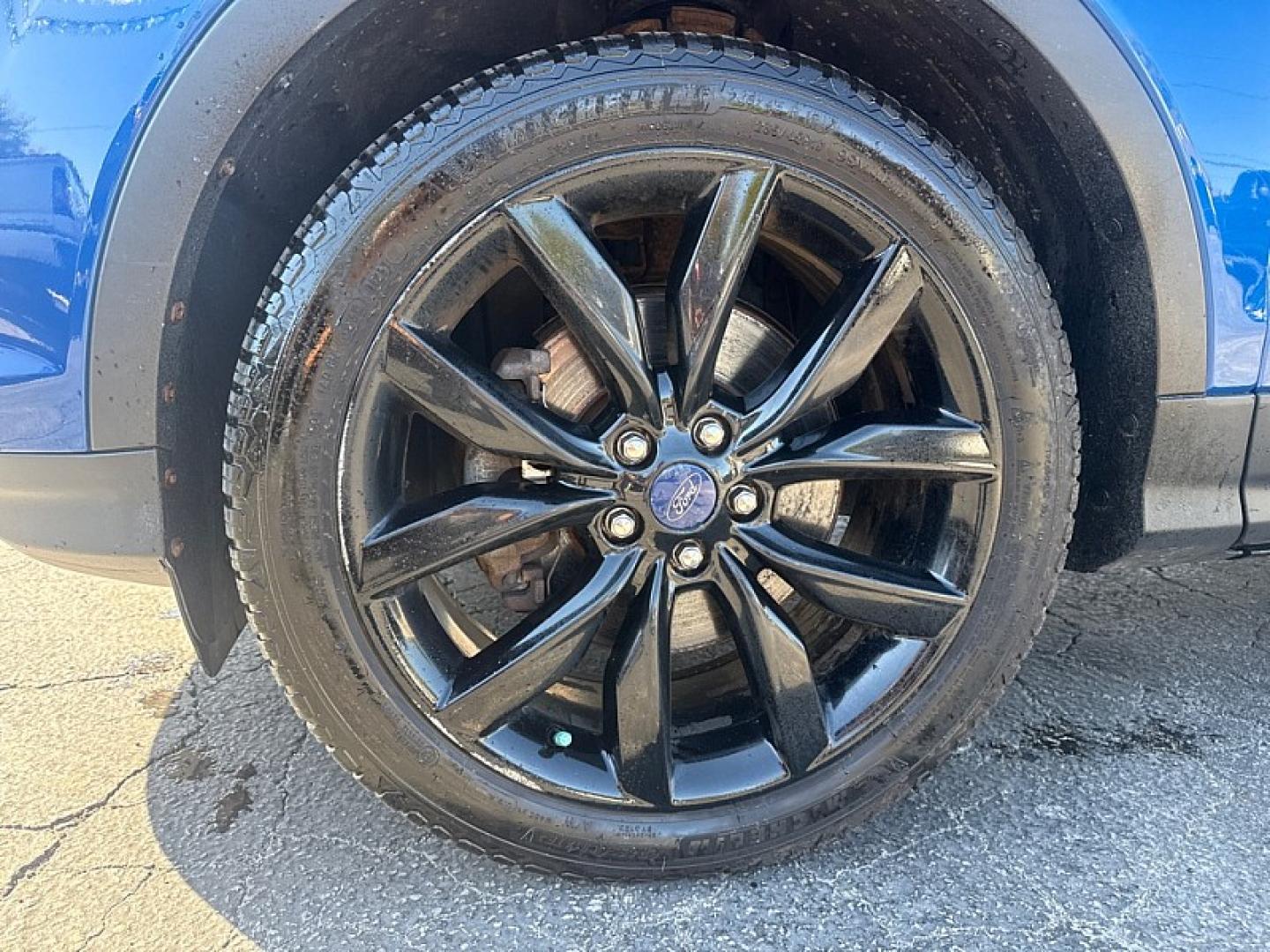 2017 BLUE /BLACK Ford Escape Titanium 4WD (1FMCU9J95HU) with an 2.0L L4 DOHC 16V engine, 6A transmission, located at 3304 Woodville Road, Northwood, OH, 43619, (419) 210-8019, 41.612694, -83.480743 - Your #1 Destination for Auto Loans and mdash;No Matter Your Credit!At our dealership, we believe everyone deserves the opportunity to drive their dream car and mdash;whether you have good credit, bad credit, or no credit at all. With a wide selection of hundreds of cars, trucks, and SUVs, you'll fin- Photo#16