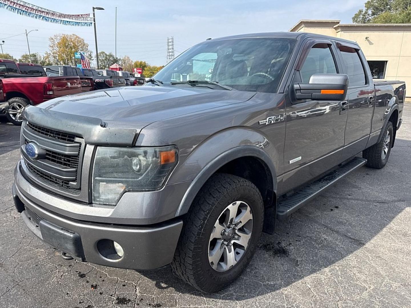 2013 GRAY /BLACK Ford F-150 XLT SuperCrew 6.5-ft. Bed 4WD (1FTFW1ET2DK) with an 3.5L V6 TURBO engine, 6-Speed Automatic transmission, located at 3304 Woodville Road, Northwood, OH, 43619, (419) 210-8019, 41.612694, -83.480743 - Your #1 Destination for Auto Loans and mdash;No Matter Your Credit!At our dealership, we believe everyone deserves the opportunity to drive their dream car and mdash;whether you have good credit, bad credit, or no credit at all. With a wide selection of hundreds of cars, trucks, and SUVs, you'll fin- Photo#0