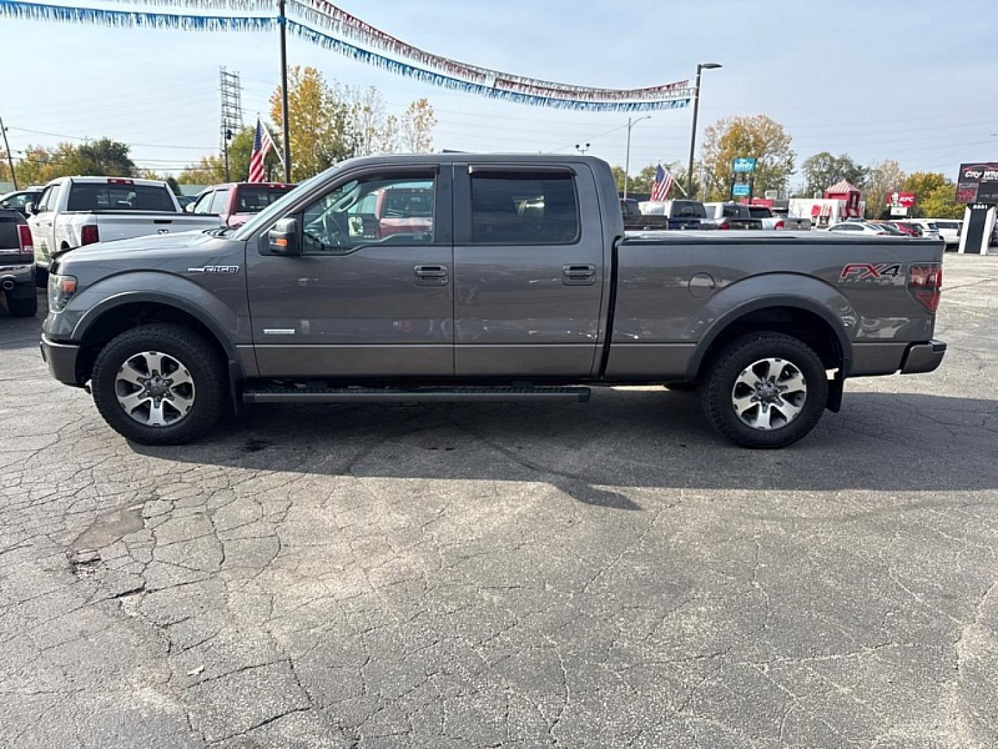 2013 GRAY /BLACK Ford F-150 XLT SuperCrew 6.5-ft. Bed 4WD (1FTFW1ET2DK) with an 3.5L V6 TURBO engine, 6-Speed Automatic transmission, located at 3304 Woodville Road, Northwood, OH, 43619, (419) 210-8019, 41.612694, -83.480743 - Your #1 Destination for Auto Loans and mdash;No Matter Your Credit!At our dealership, we believe everyone deserves the opportunity to drive their dream car and mdash;whether you have good credit, bad credit, or no credit at all. With a wide selection of hundreds of cars, trucks, and SUVs, you'll fin- Photo#1