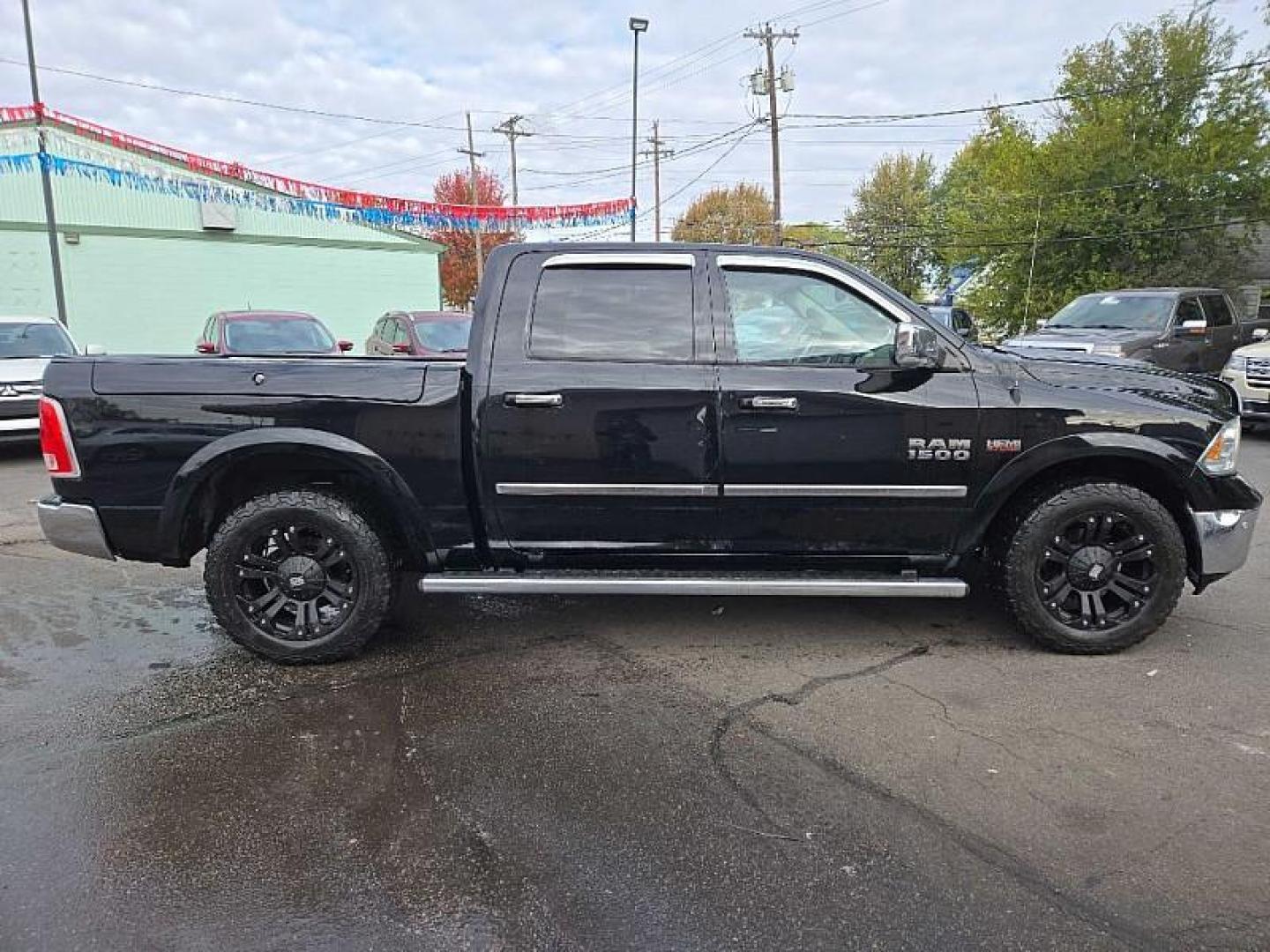 2015 BLACK /BLACK RAM 1500 Longhorn Crew Cab SWB 4WD (1C6RR7PTXFS) with an 5.7L V8 OHV 16V engine, 6-Speed Automatic transmission, located at 3304 Woodville Road, Northwood, OH, 43619, (419) 210-8019, 41.612694, -83.480743 - Photo#5