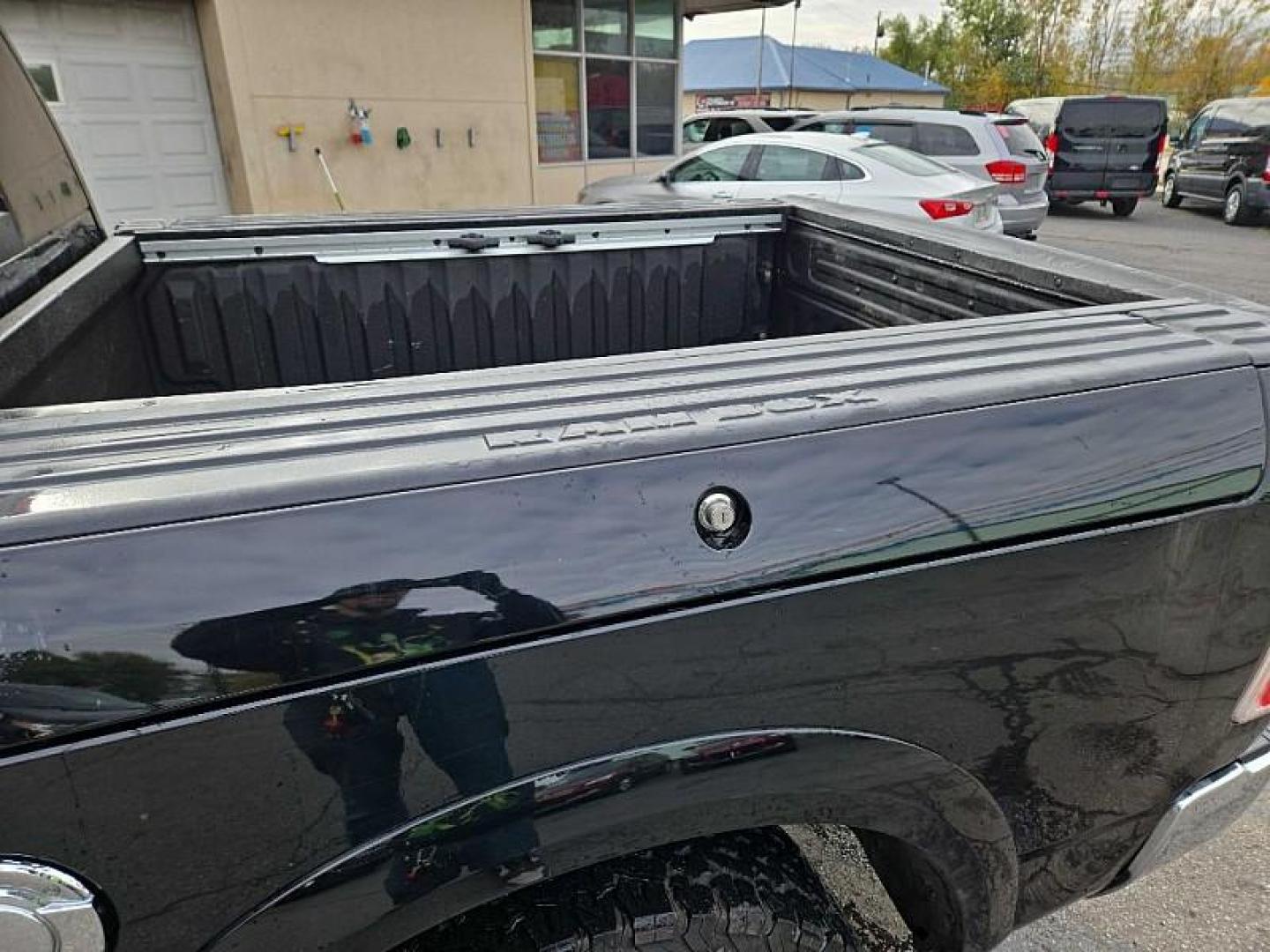 2015 BLACK /BLACK RAM 1500 Longhorn Crew Cab SWB 4WD (1C6RR7PTXFS) with an 5.7L V8 OHV 16V engine, 6-Speed Automatic transmission, located at 3304 Woodville Road, Northwood, OH, 43619, (419) 210-8019, 41.612694, -83.480743 - Photo#12