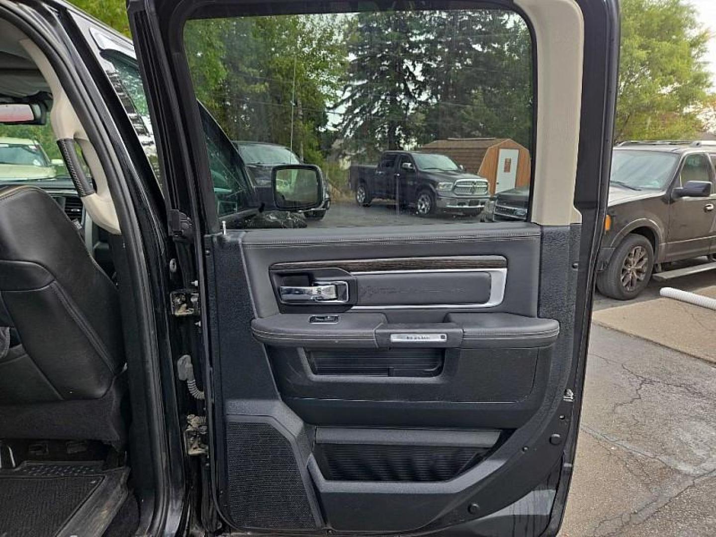 2015 BLACK /BLACK RAM 1500 Longhorn Crew Cab SWB 4WD (1C6RR7PTXFS) with an 5.7L V8 OHV 16V engine, 6-Speed Automatic transmission, located at 3304 Woodville Road, Northwood, OH, 43619, (419) 210-8019, 41.612694, -83.480743 - Photo#15