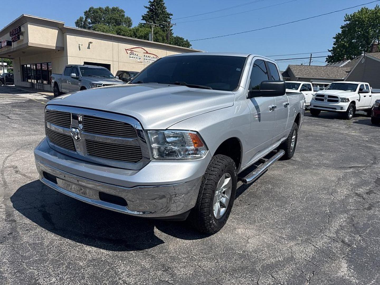 2017 SILVER /BLACK RAM 1500 SLT Quad Cab 4WD (1C6RR7GG5HS) with an 3.6L V6 DOHC 24V FFV engine, 8A transmission, located at 3304 Woodville Road, Northwood, OH, 43619, (419) 210-8019, 41.612694, -83.480743 - Your #1 Destination for Auto Loans and mdash;No Matter Your Credit!At our dealership, we believe everyone deserves the opportunity to drive their dream car and mdash;whether you have good credit, bad credit, or no credit at all. With a wide selection of hundreds of cars, trucks, and SUVs, you'll fin- Photo#0