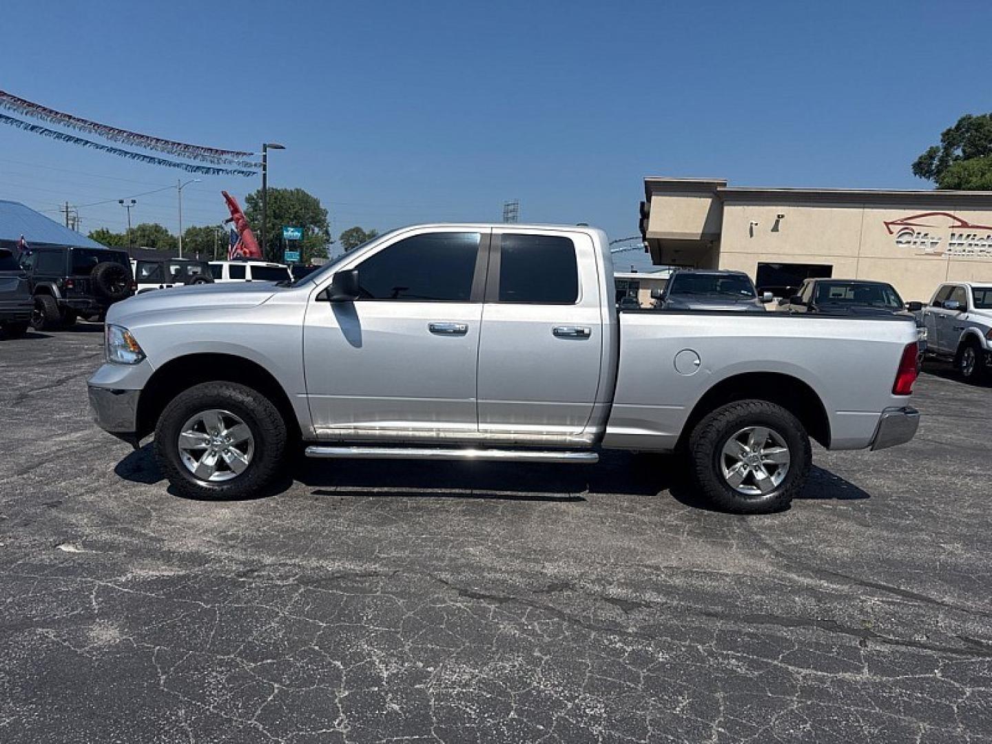 2017 SILVER /BLACK RAM 1500 SLT Quad Cab 4WD (1C6RR7GG5HS) with an 3.6L V6 DOHC 24V FFV engine, 8A transmission, located at 3304 Woodville Road, Northwood, OH, 43619, (419) 210-8019, 41.612694, -83.480743 - Your #1 Destination for Auto Loans and mdash;No Matter Your Credit!At our dealership, we believe everyone deserves the opportunity to drive their dream car and mdash;whether you have good credit, bad credit, or no credit at all. With a wide selection of hundreds of cars, trucks, and SUVs, you'll fin- Photo#1
