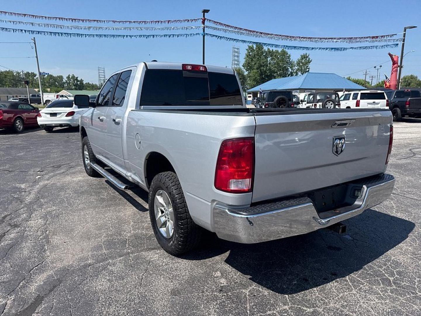 2017 SILVER /BLACK RAM 1500 SLT Quad Cab 4WD (1C6RR7GG5HS) with an 3.6L V6 DOHC 24V FFV engine, 8A transmission, located at 3304 Woodville Road, Northwood, OH, 43619, (419) 210-8019, 41.612694, -83.480743 - Your #1 Destination for Auto Loans and mdash;No Matter Your Credit!At our dealership, we believe everyone deserves the opportunity to drive their dream car and mdash;whether you have good credit, bad credit, or no credit at all. With a wide selection of hundreds of cars, trucks, and SUVs, you'll fin- Photo#2