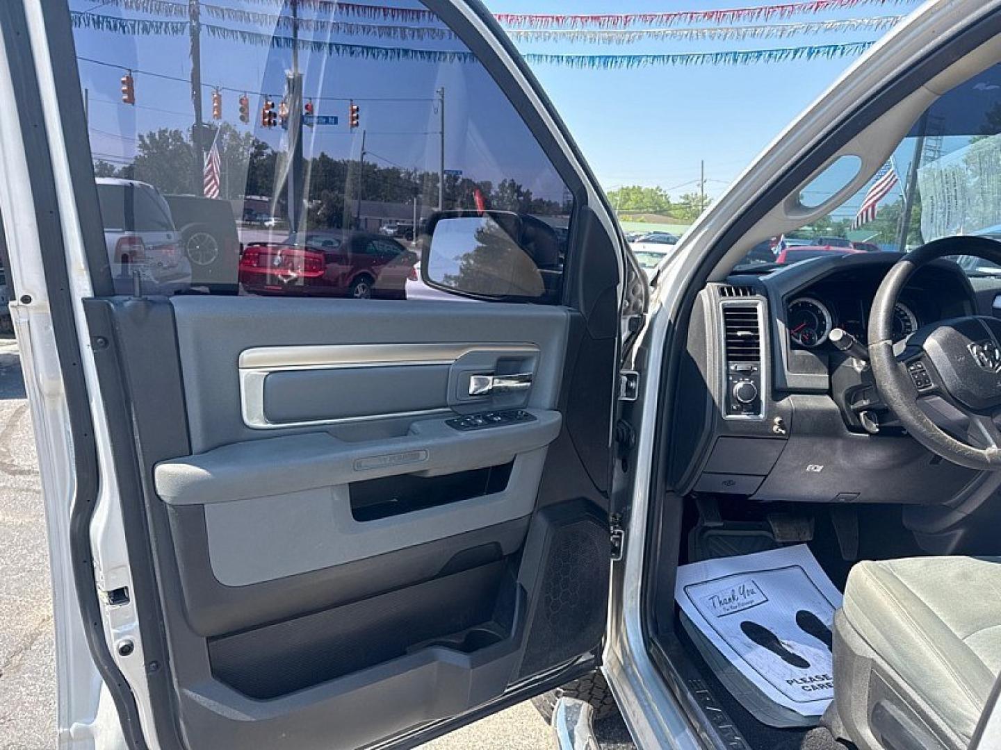 2017 SILVER /BLACK RAM 1500 SLT Quad Cab 4WD (1C6RR7GG5HS) with an 3.6L V6 DOHC 24V FFV engine, 8A transmission, located at 3304 Woodville Road, Northwood, OH, 43619, (419) 210-8019, 41.612694, -83.480743 - Your #1 Destination for Auto Loans and mdash;No Matter Your Credit!At our dealership, we believe everyone deserves the opportunity to drive their dream car and mdash;whether you have good credit, bad credit, or no credit at all. With a wide selection of hundreds of cars, trucks, and SUVs, you'll fin- Photo#5
