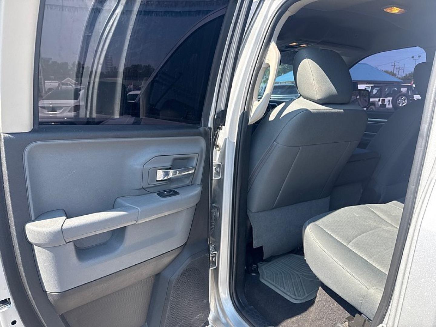 2017 SILVER /BLACK RAM 1500 SLT Quad Cab 4WD (1C6RR7GG5HS) with an 3.6L V6 DOHC 24V FFV engine, 8A transmission, located at 3304 Woodville Road, Northwood, OH, 43619, (419) 210-8019, 41.612694, -83.480743 - Your #1 Destination for Auto Loans and mdash;No Matter Your Credit!At our dealership, we believe everyone deserves the opportunity to drive their dream car and mdash;whether you have good credit, bad credit, or no credit at all. With a wide selection of hundreds of cars, trucks, and SUVs, you'll fin- Photo#7