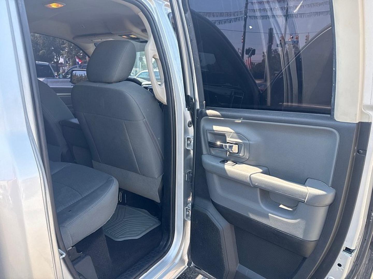 2017 SILVER /BLACK RAM 1500 SLT Quad Cab 4WD (1C6RR7GG5HS) with an 3.6L V6 DOHC 24V FFV engine, 8A transmission, located at 3304 Woodville Road, Northwood, OH, 43619, (419) 210-8019, 41.612694, -83.480743 - Your #1 Destination for Auto Loans and mdash;No Matter Your Credit!At our dealership, we believe everyone deserves the opportunity to drive their dream car and mdash;whether you have good credit, bad credit, or no credit at all. With a wide selection of hundreds of cars, trucks, and SUVs, you'll fin- Photo#9