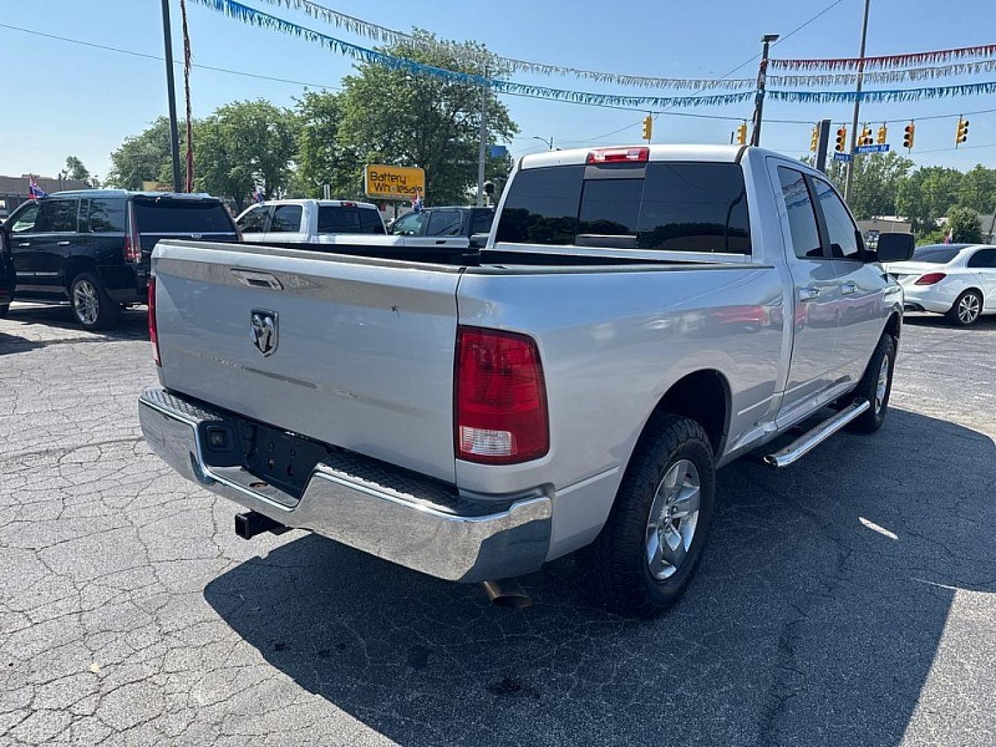 2017 SILVER /BLACK RAM 1500 SLT Quad Cab 4WD (1C6RR7GG5HS) with an 3.6L V6 DOHC 24V FFV engine, 8A transmission, located at 3304 Woodville Road, Northwood, OH, 43619, (419) 210-8019, 41.612694, -83.480743 - Your #1 Destination for Auto Loans and mdash;No Matter Your Credit!At our dealership, we believe everyone deserves the opportunity to drive their dream car and mdash;whether you have good credit, bad credit, or no credit at all. With a wide selection of hundreds of cars, trucks, and SUVs, you'll fin- Photo#13
