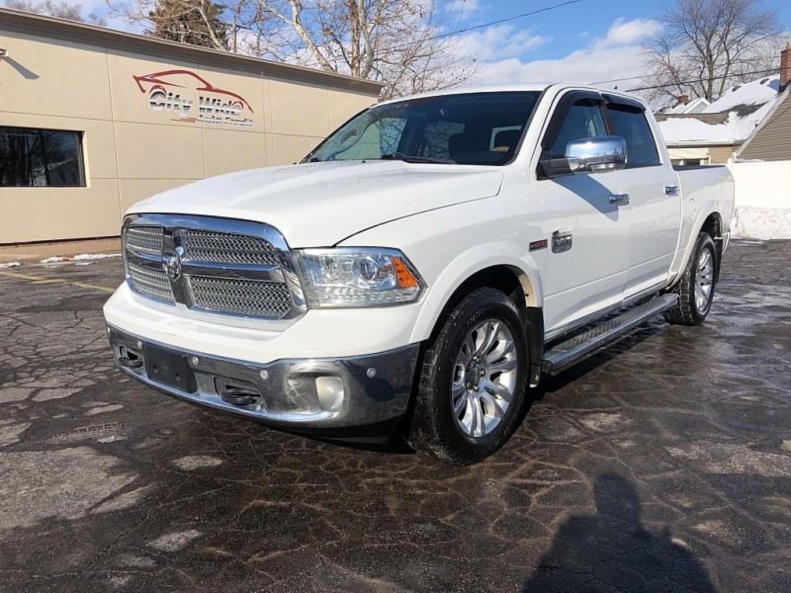 2014 WHITE Ram 1500 4WD (1C6RR7PM1ES) with an V6 Turbo EcoDsl 3.0L engine, Automatic 8-Spd transmission, located at 3304 Woodville Road, Northwood, OH, 43619, (419) 210-8019, 41.612694, -83.480743 - We are #1 Auto Loan for Good Bad or No Credit we have hundreds of vehicles to chose from stop on in or just fill out our online application to get approved for auto financing and see your credit score for free by visiting our website today. We have Low Payment Options and Terms Available to Suit Y - Photo #0